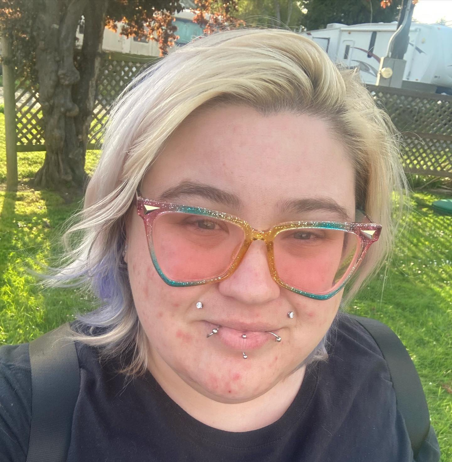 Asymmetrical blonde bixie with long side-swept layers