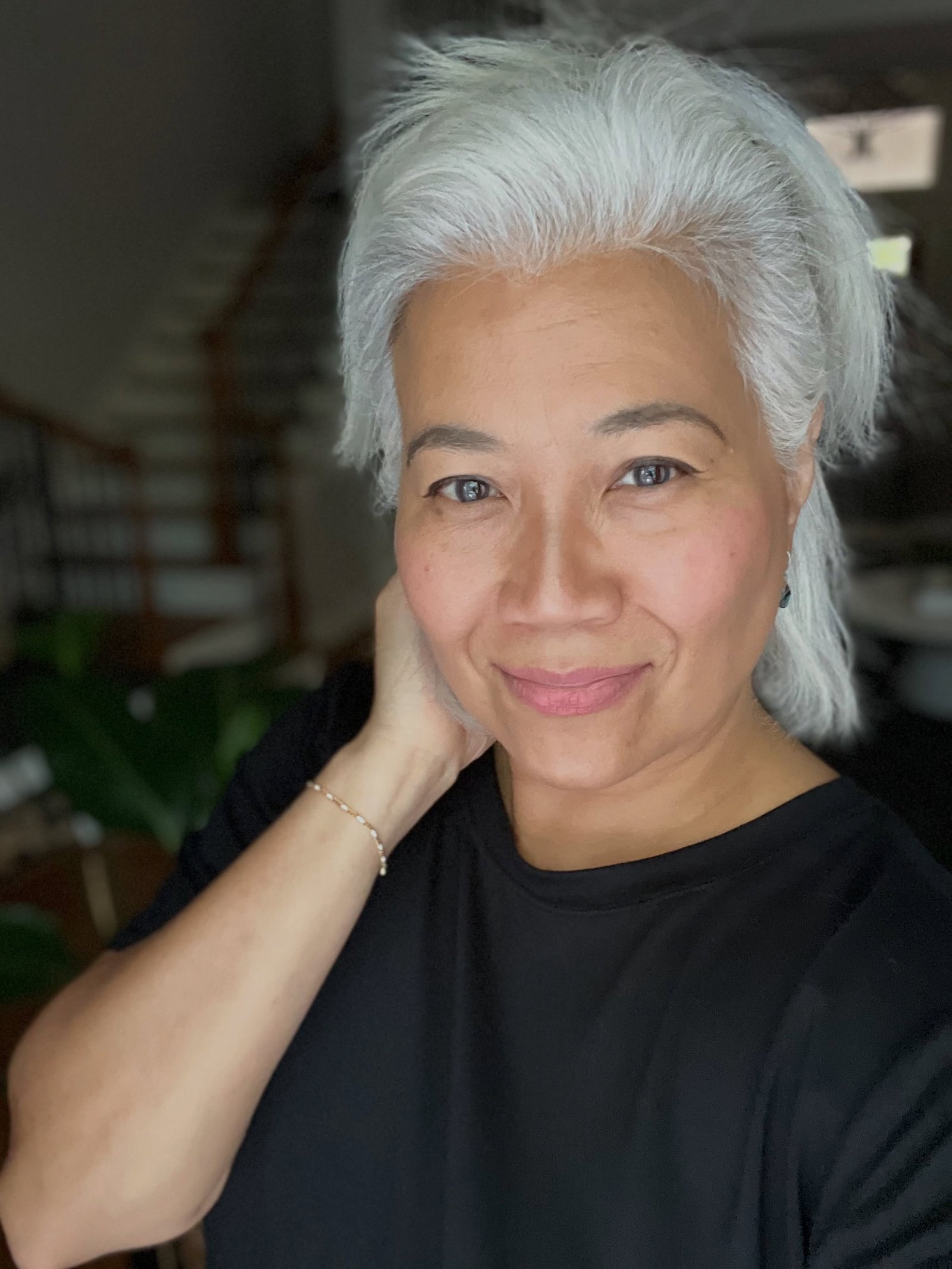 Swept-back white pixie bob with short tapered sides
