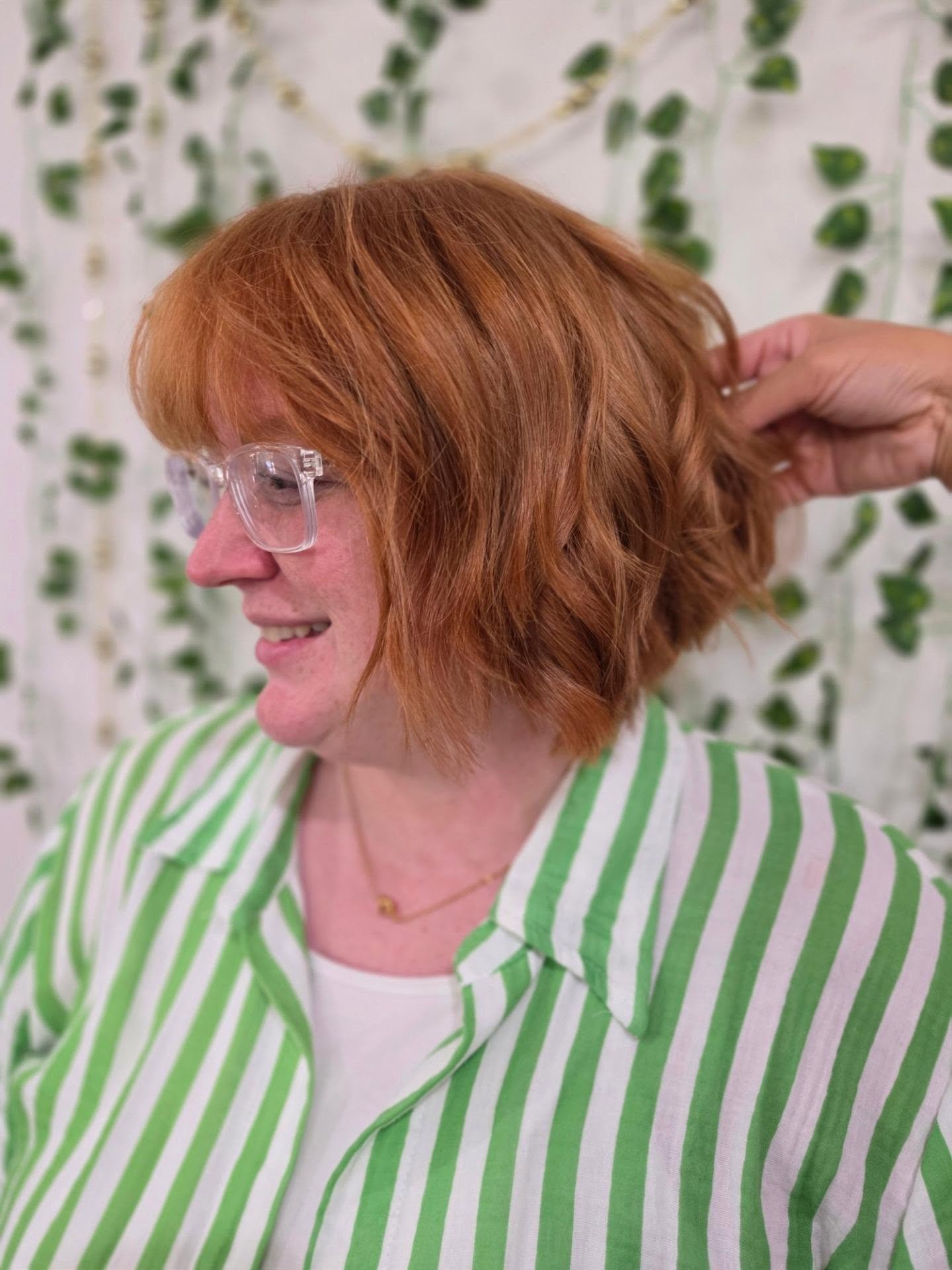 Tousled chin-length bob with a straight full fringe