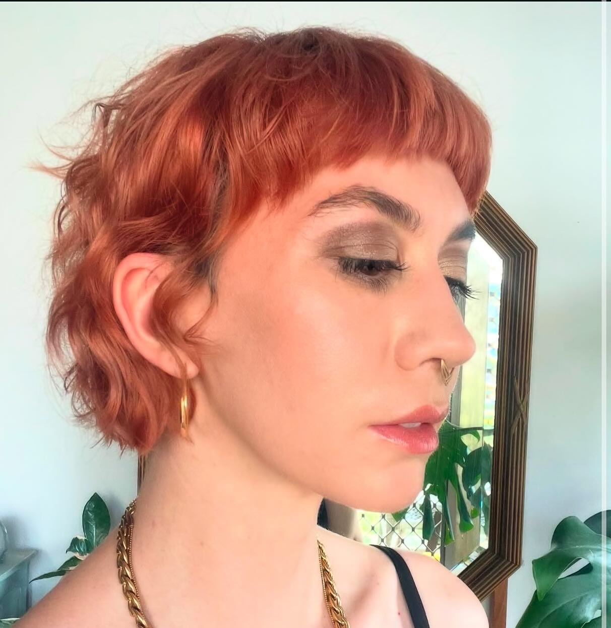 Textured red pixie mullet with short straight fringe