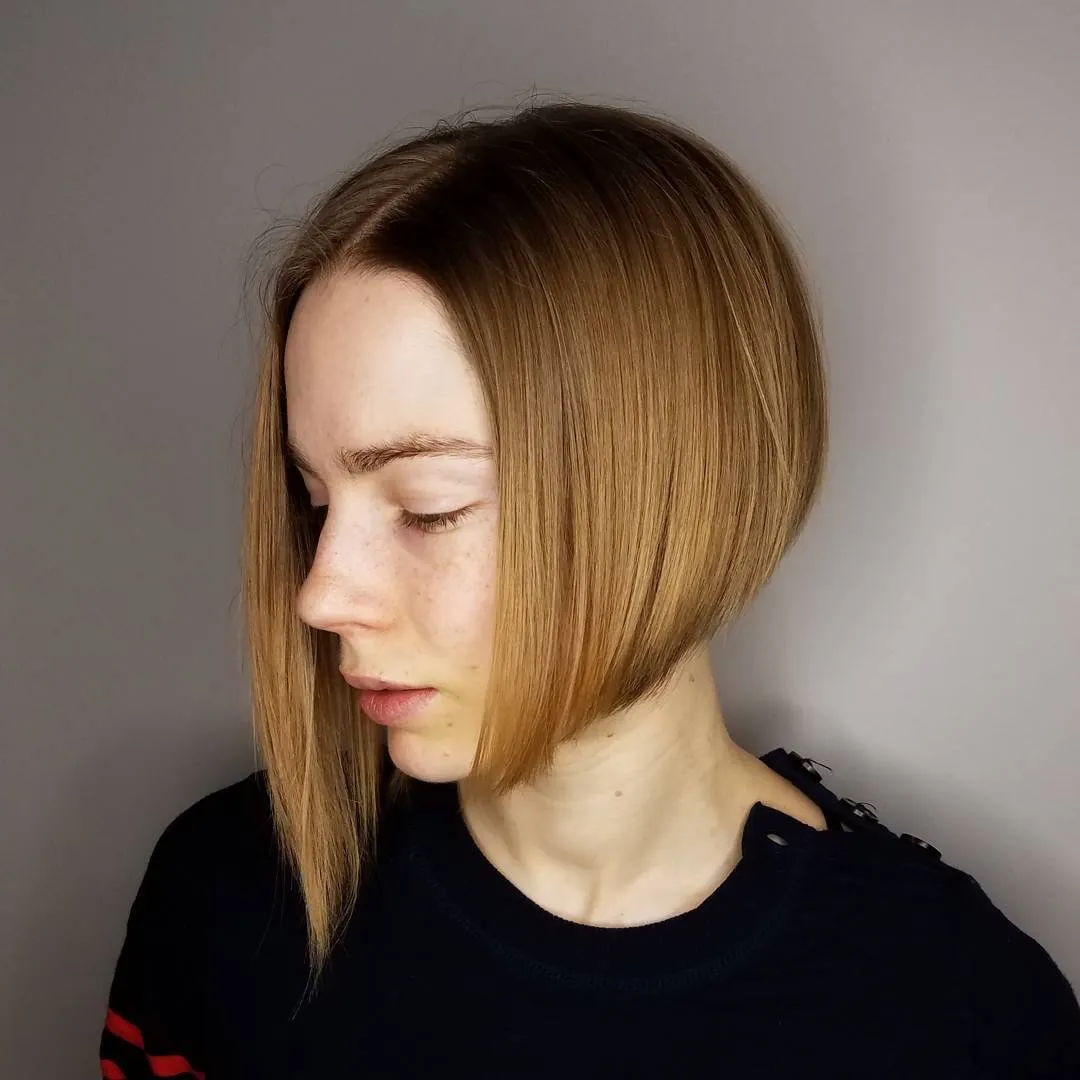 dramatic asymmetrical bob with one extended front section and short opposite side