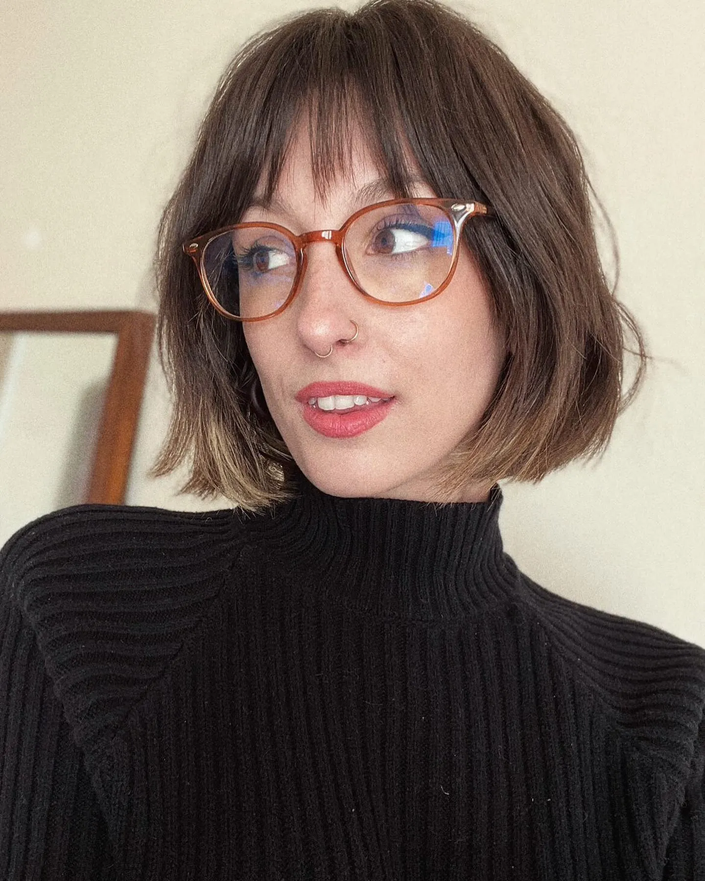 soft wavy brunette bob with wispy fringe and rounded volume