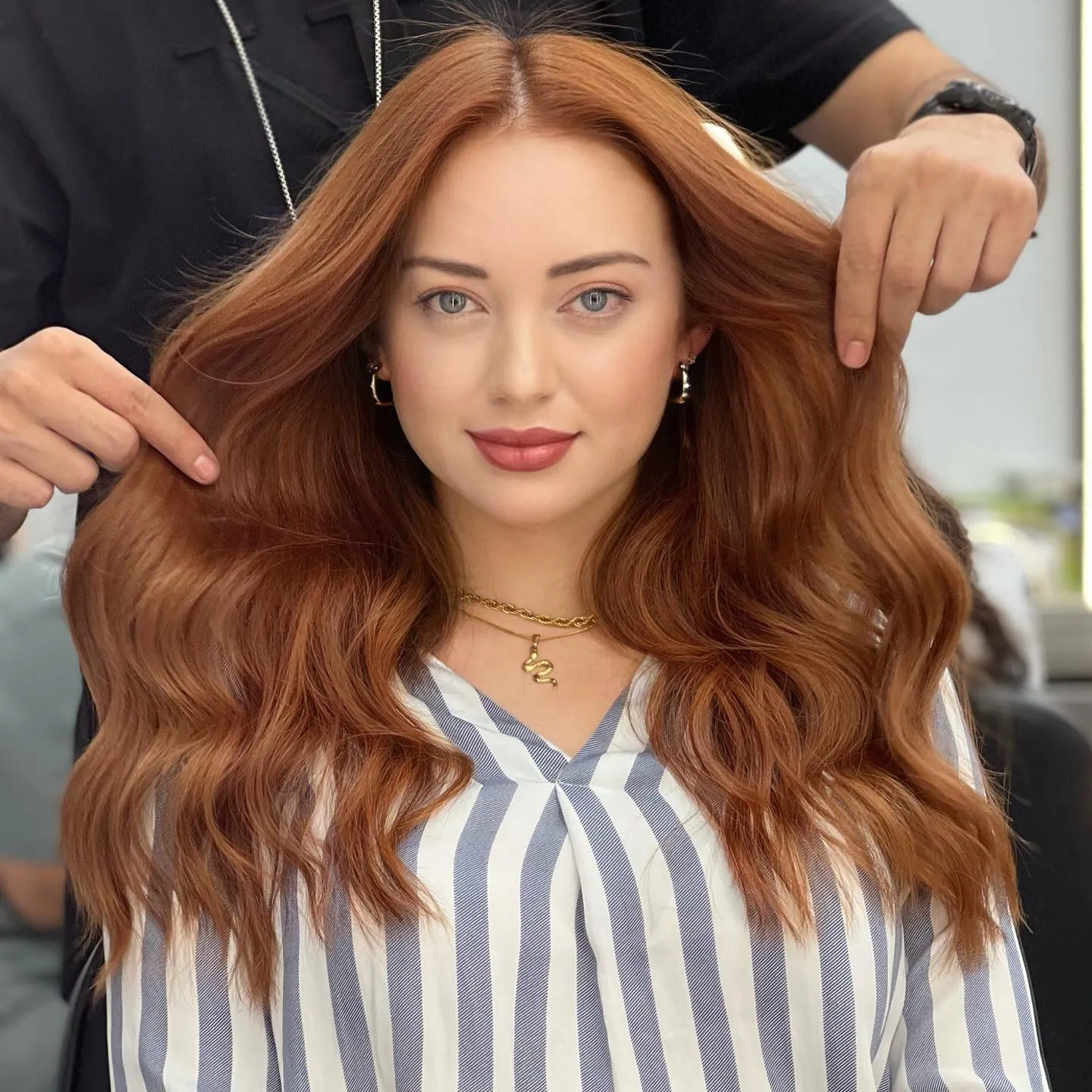 Long polished amber hair with soft layered waves