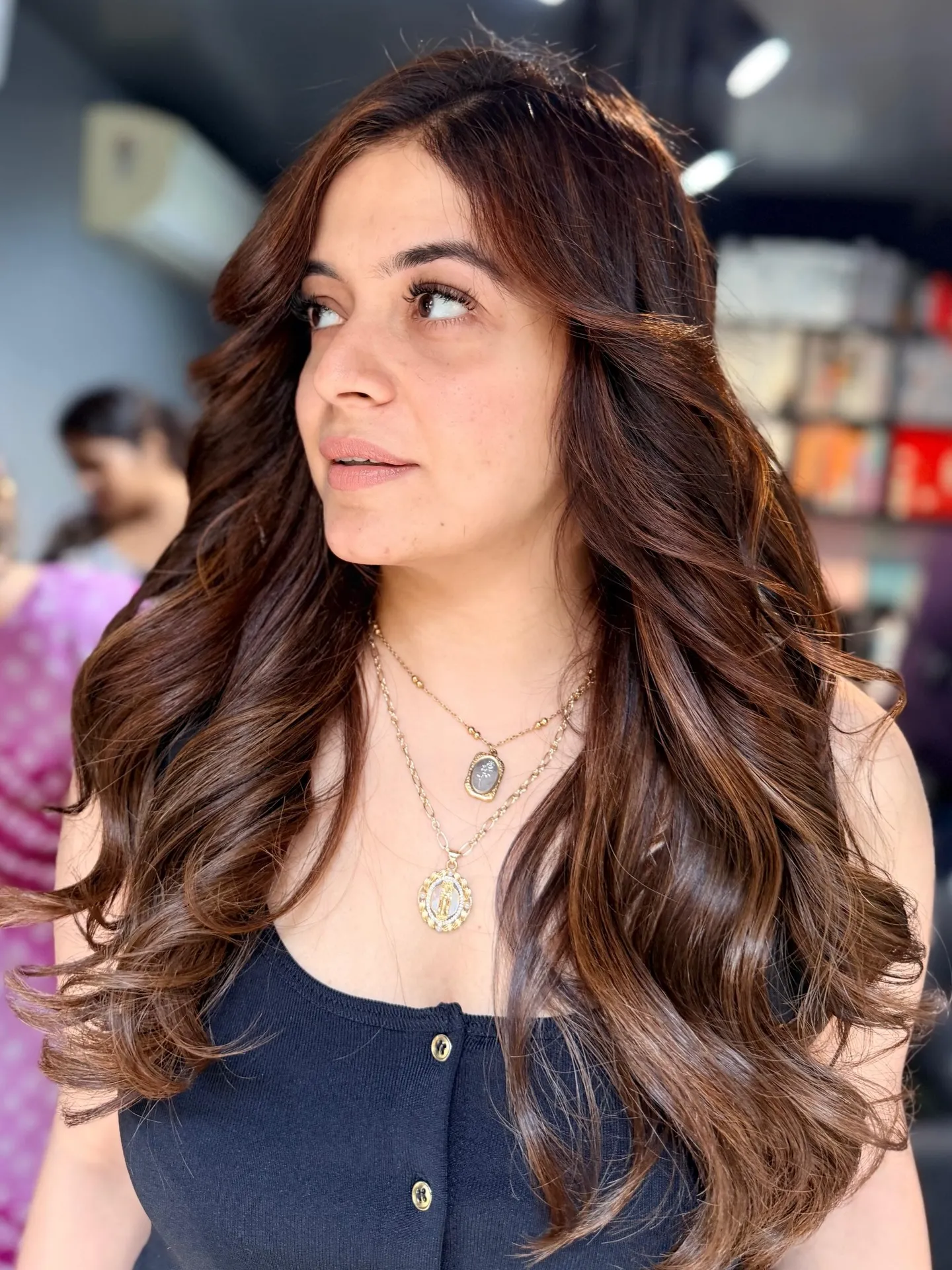 Long deep amber brown layers with loose curls