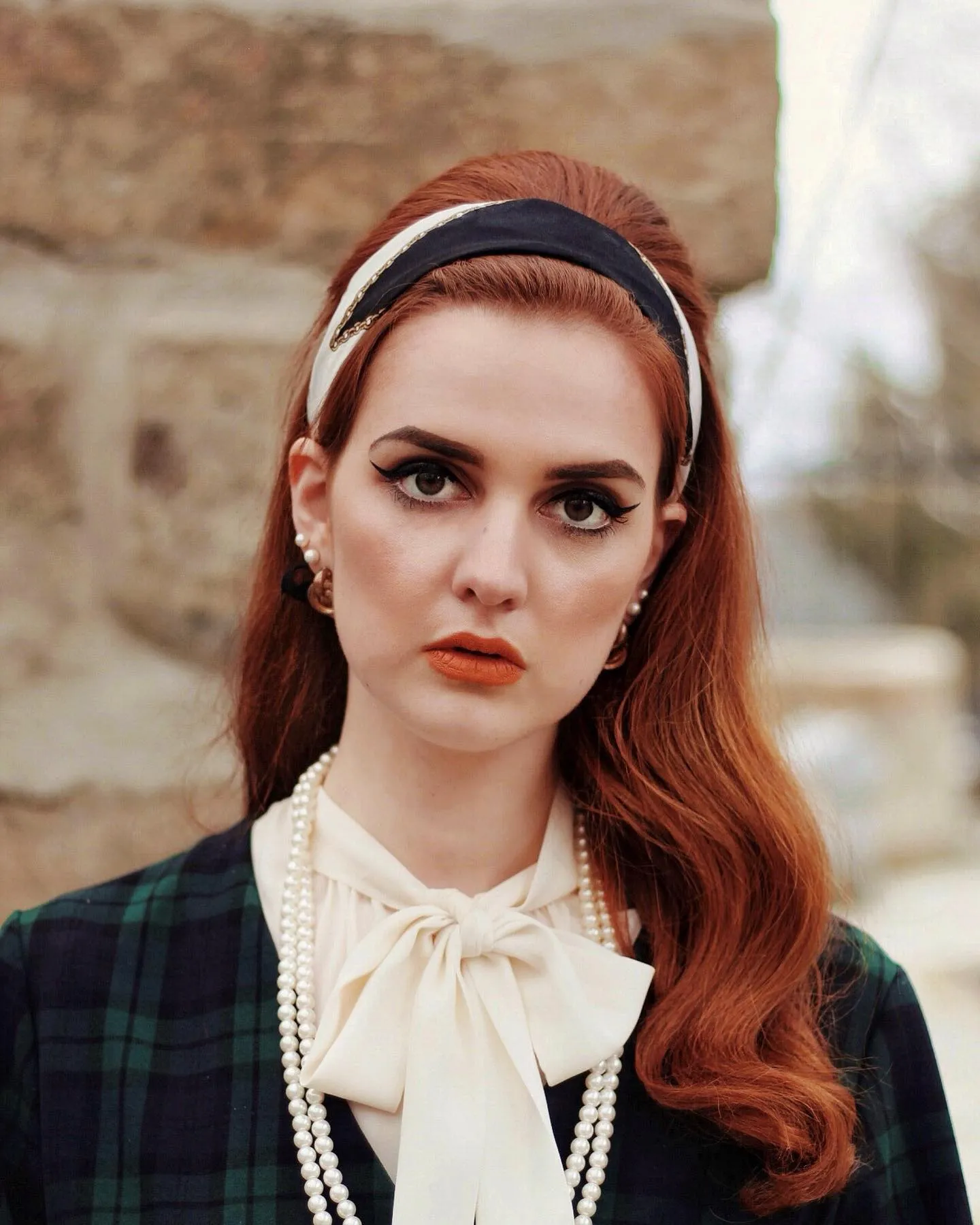 Long red amber hair with a headband and side waves
