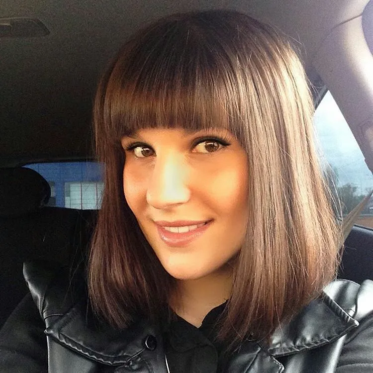 Straight angled bob with full blunt bangs