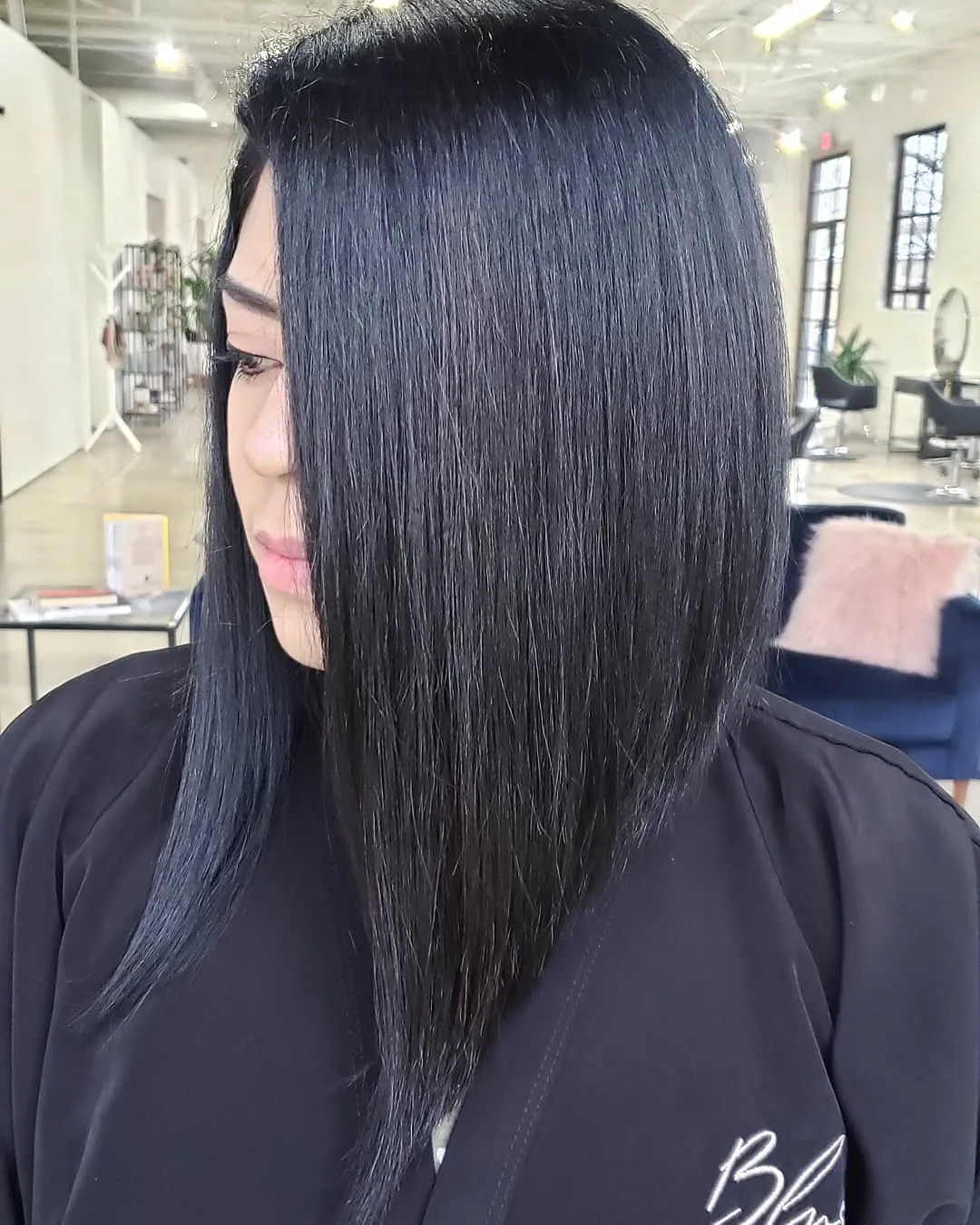 Long black angled lob with a dramatic sloping line