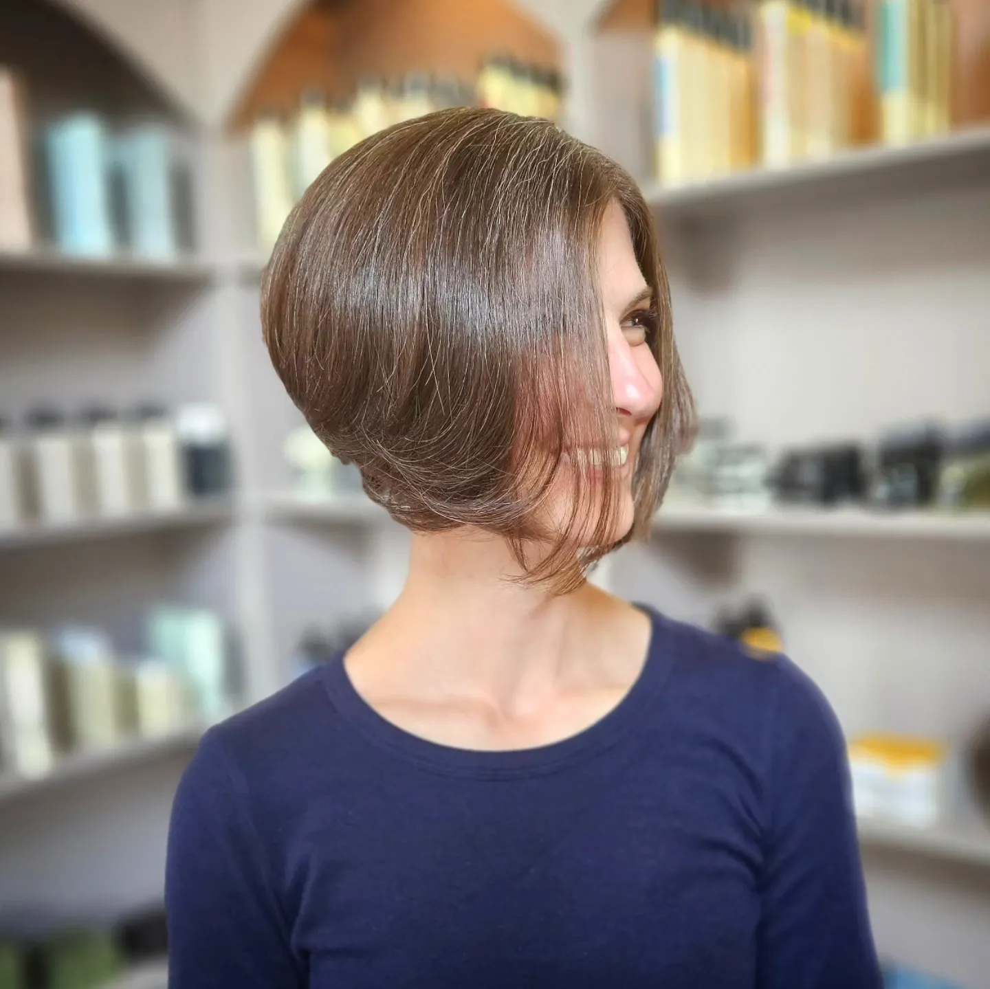 Short angled bob with a sweeping layered front