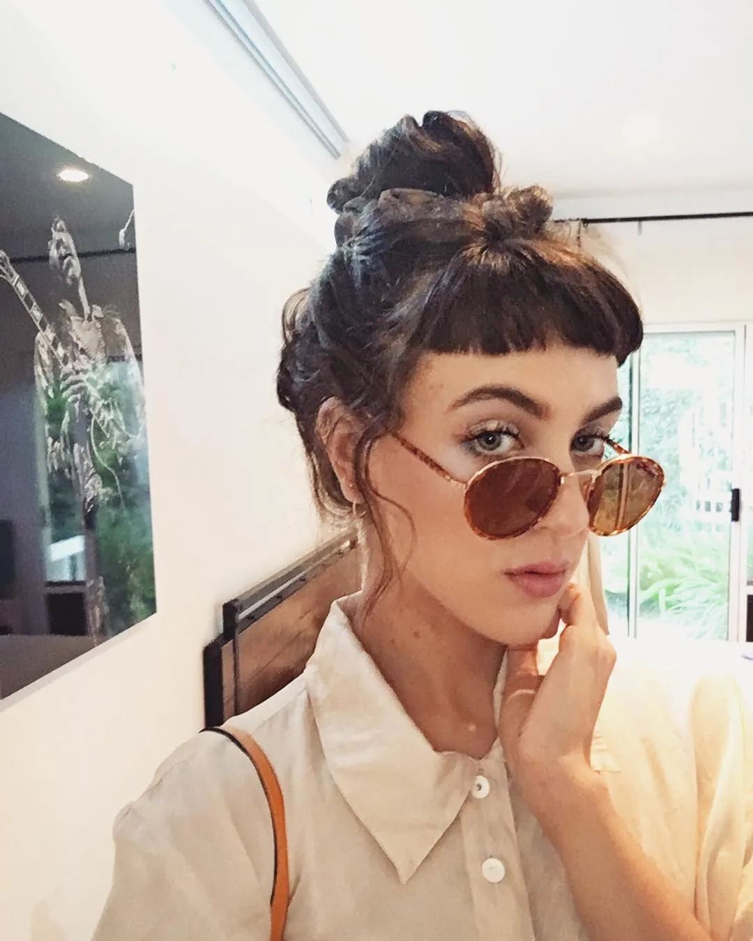 Top knot with blunt micro fringe