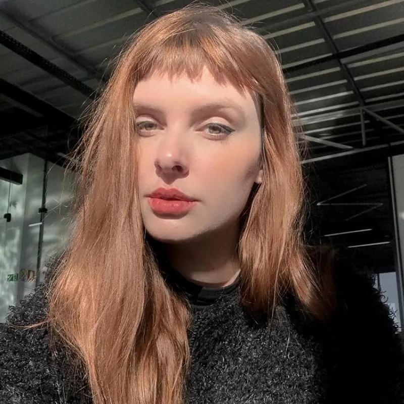Copper hair with wispy baby bangs