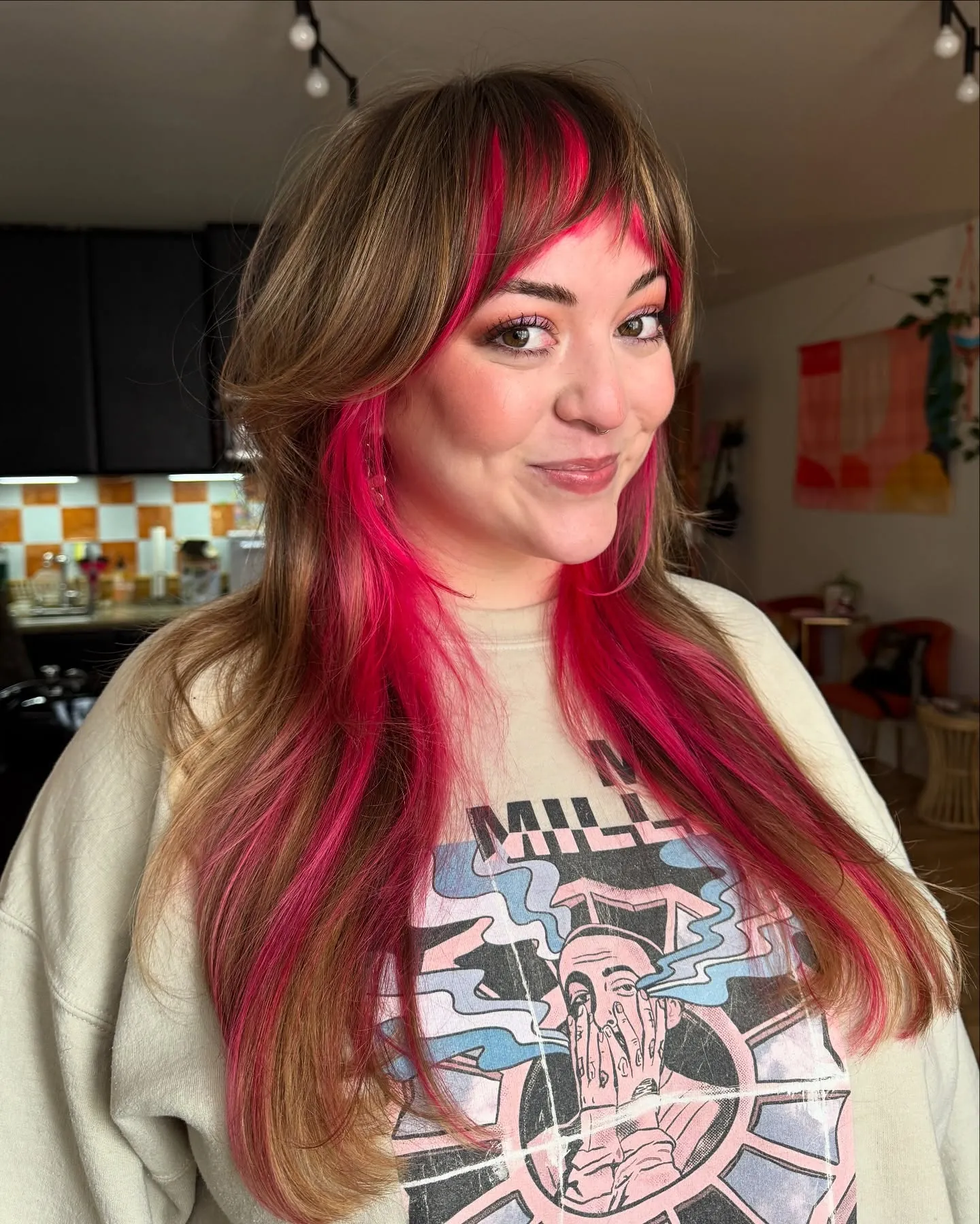 Long hair with pink color panels and curtain bangs