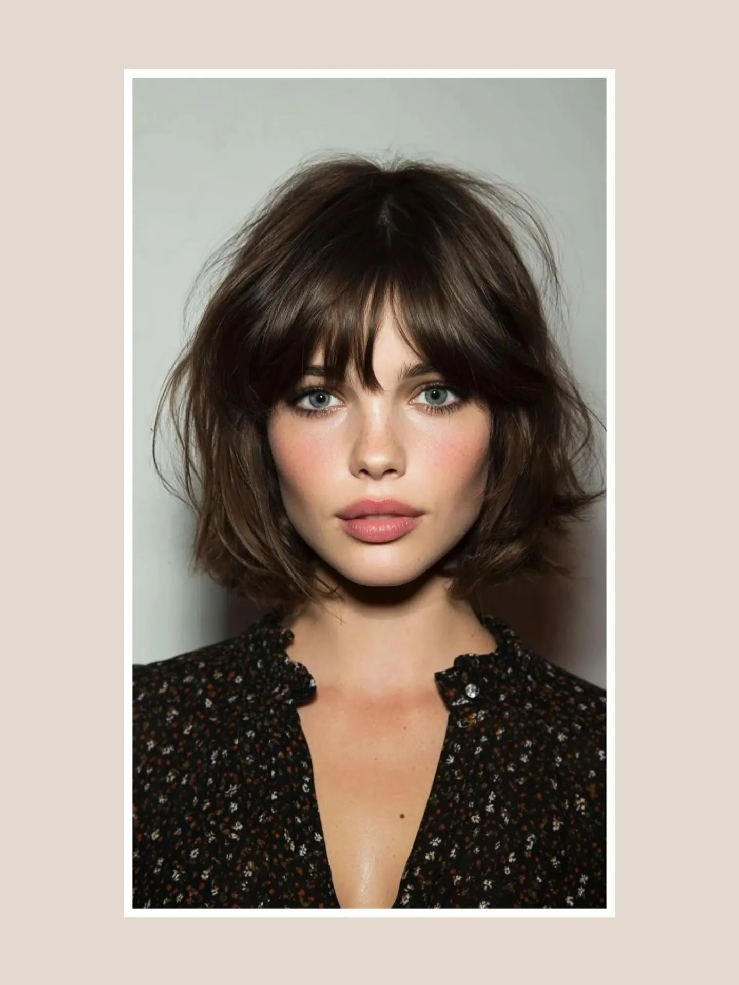 Rounded brunette bob with full soft fringe