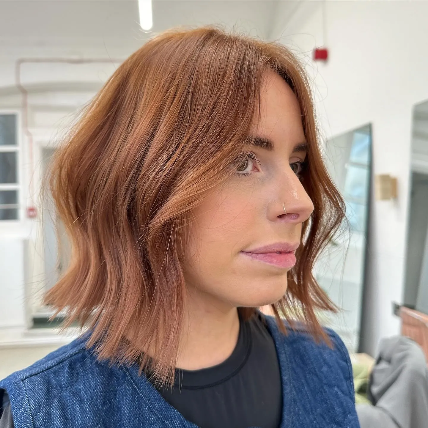 Auburn bob with soft face-framing waves