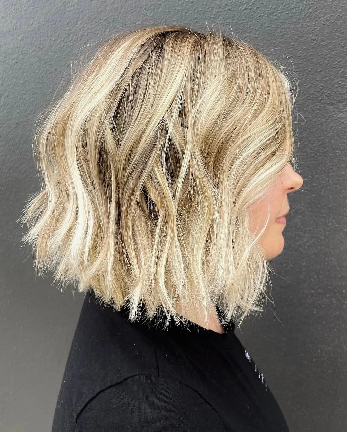 Blonde blunt bob with loose textured waves