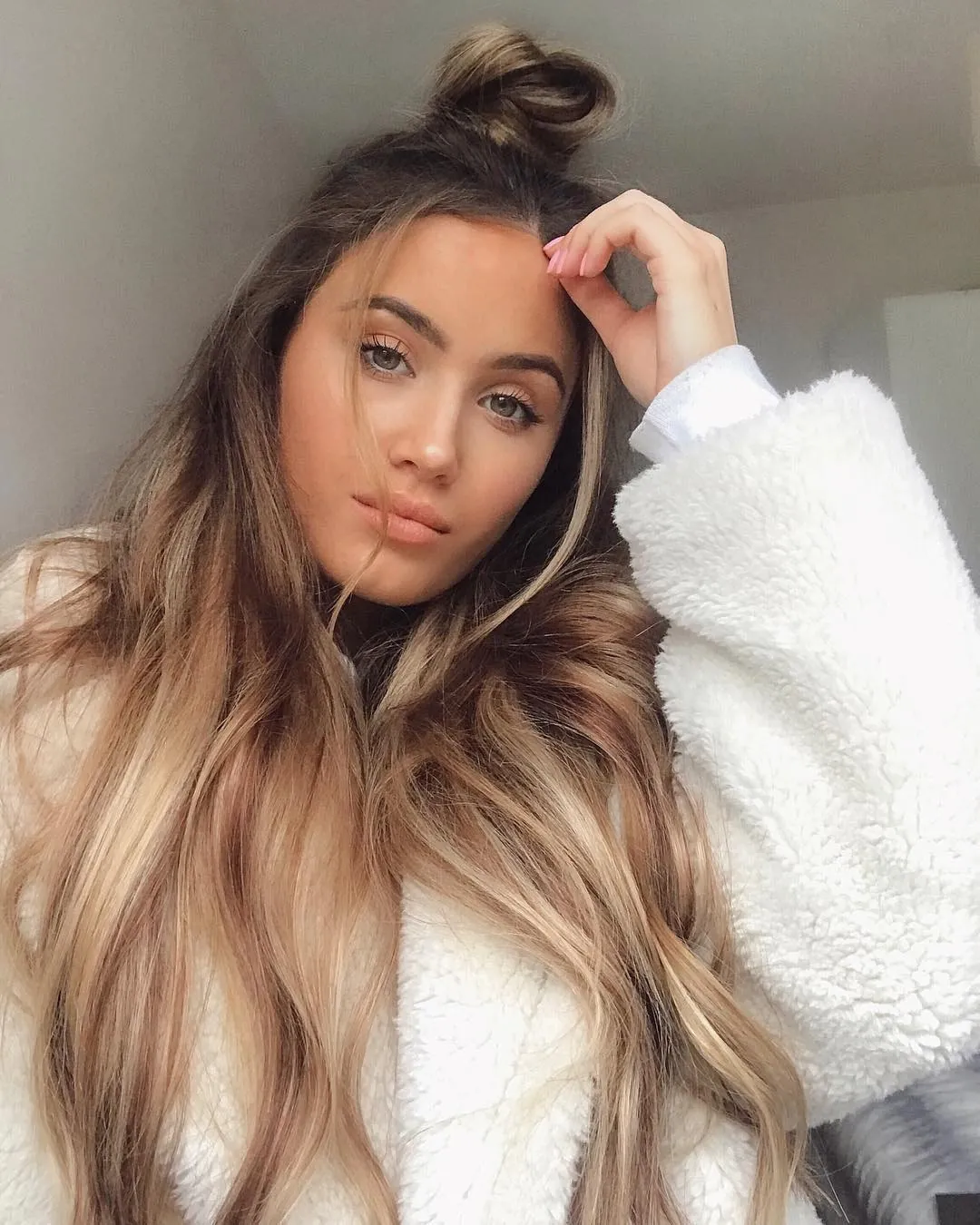 Half-up top knot with long loose waves