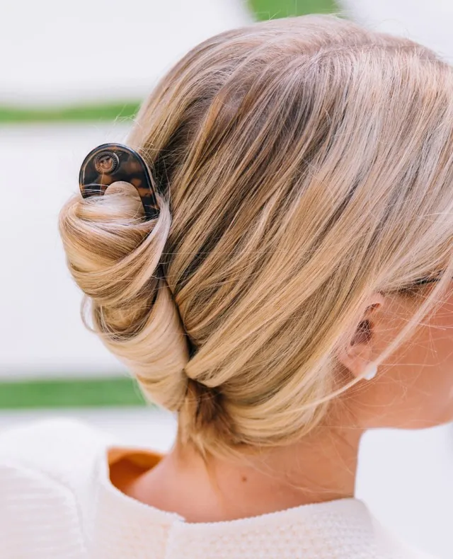 Claw clip bun on blonde hair