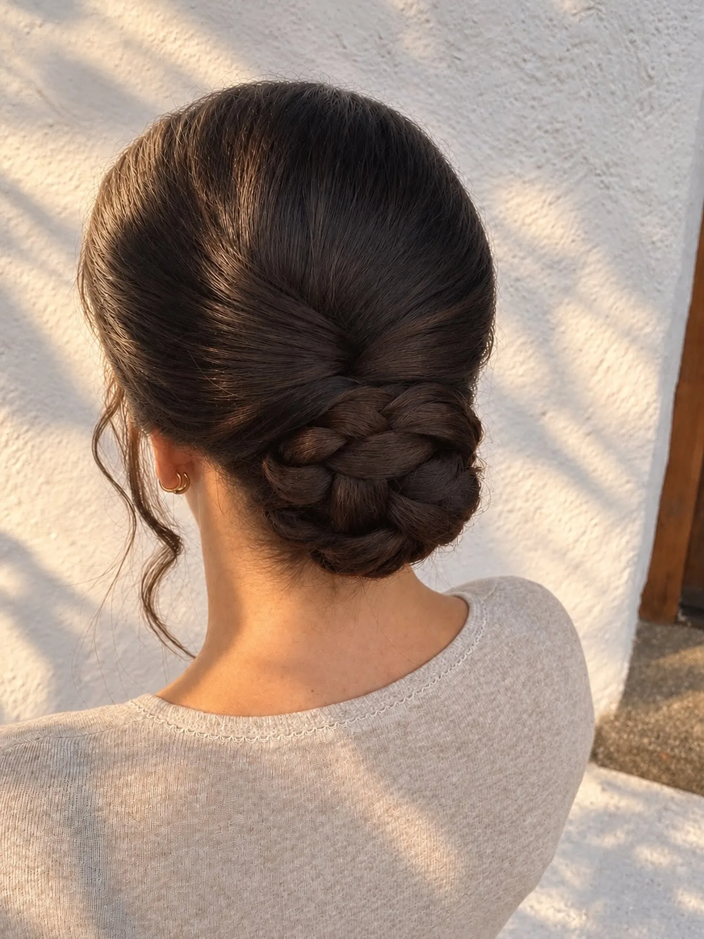 Braided low bun with smooth crown