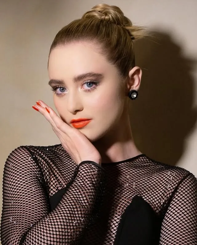 Sleek high bun with smooth finish