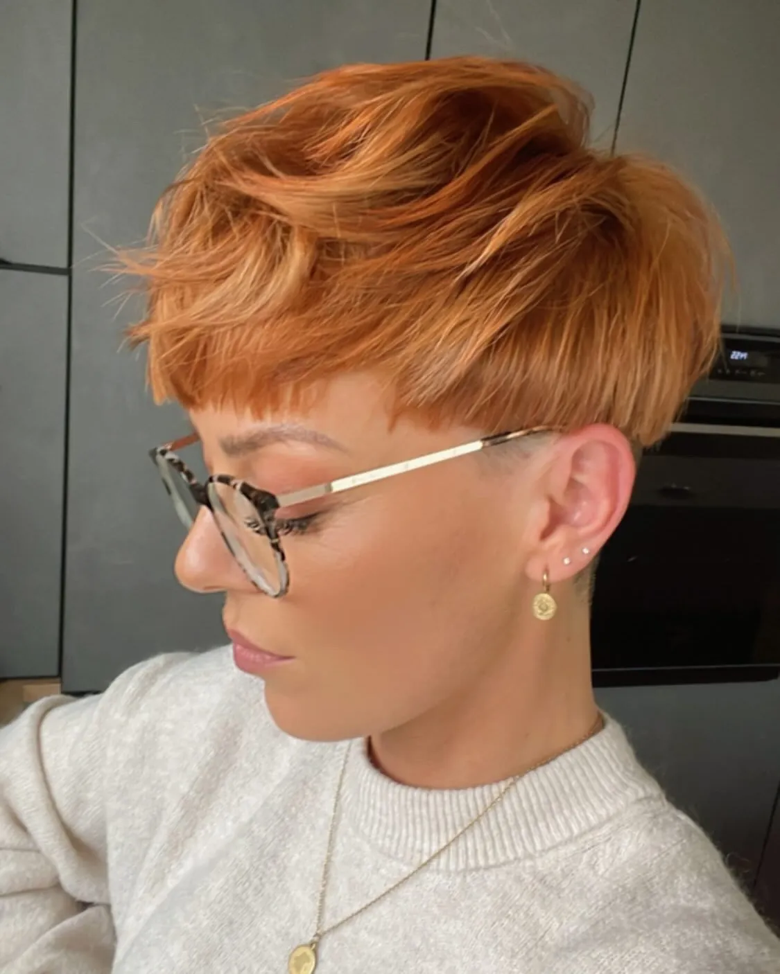 Swept textured pixie with close sides