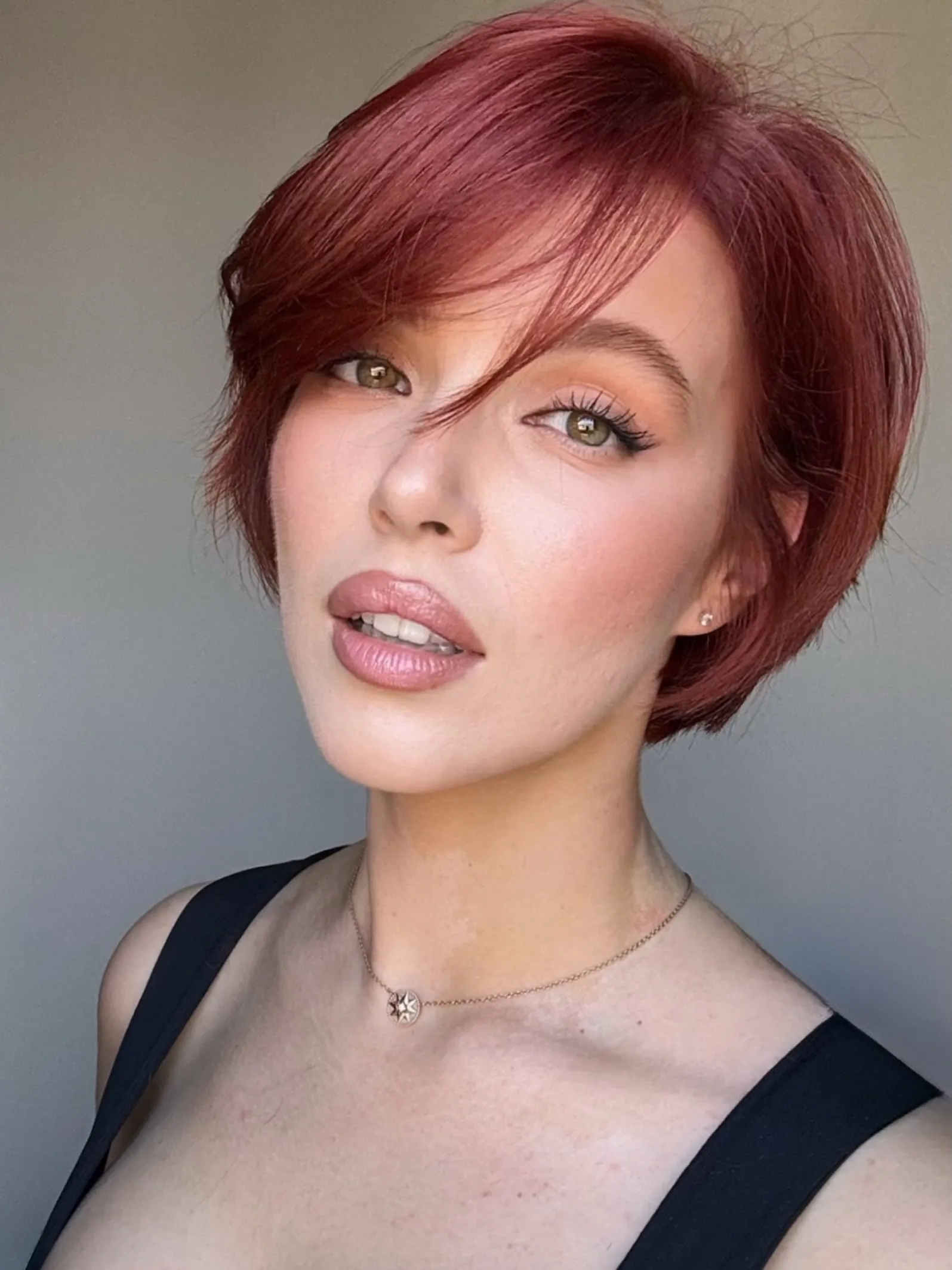 Side-swept red pixie bob