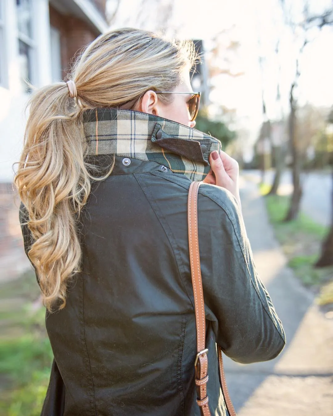 Textured blonde low ponytail with loose waves