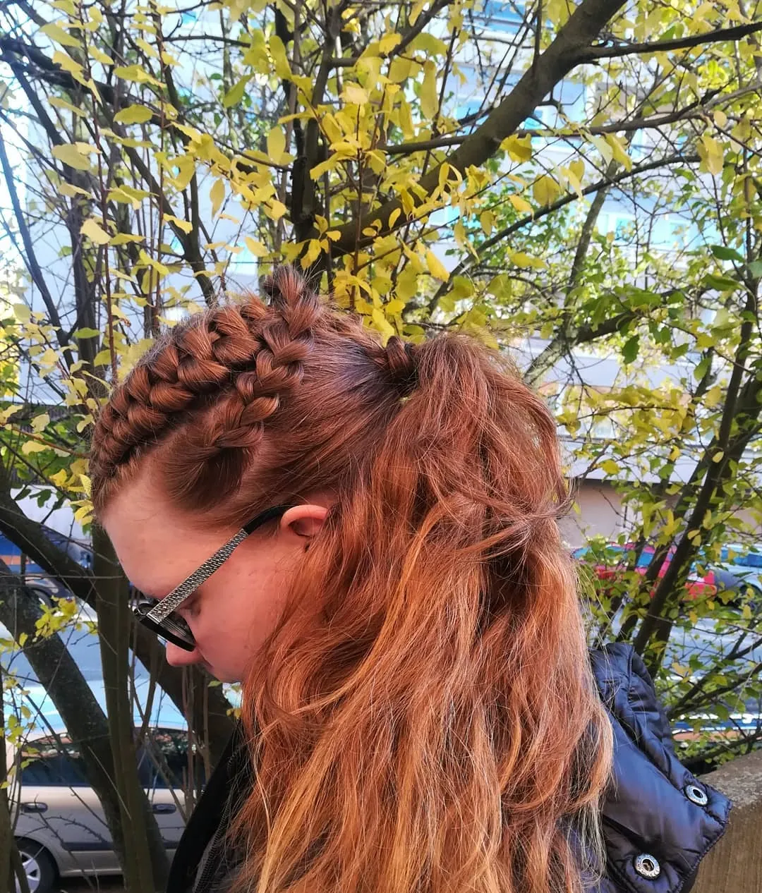 Braided half-up ponytail on copper hair
