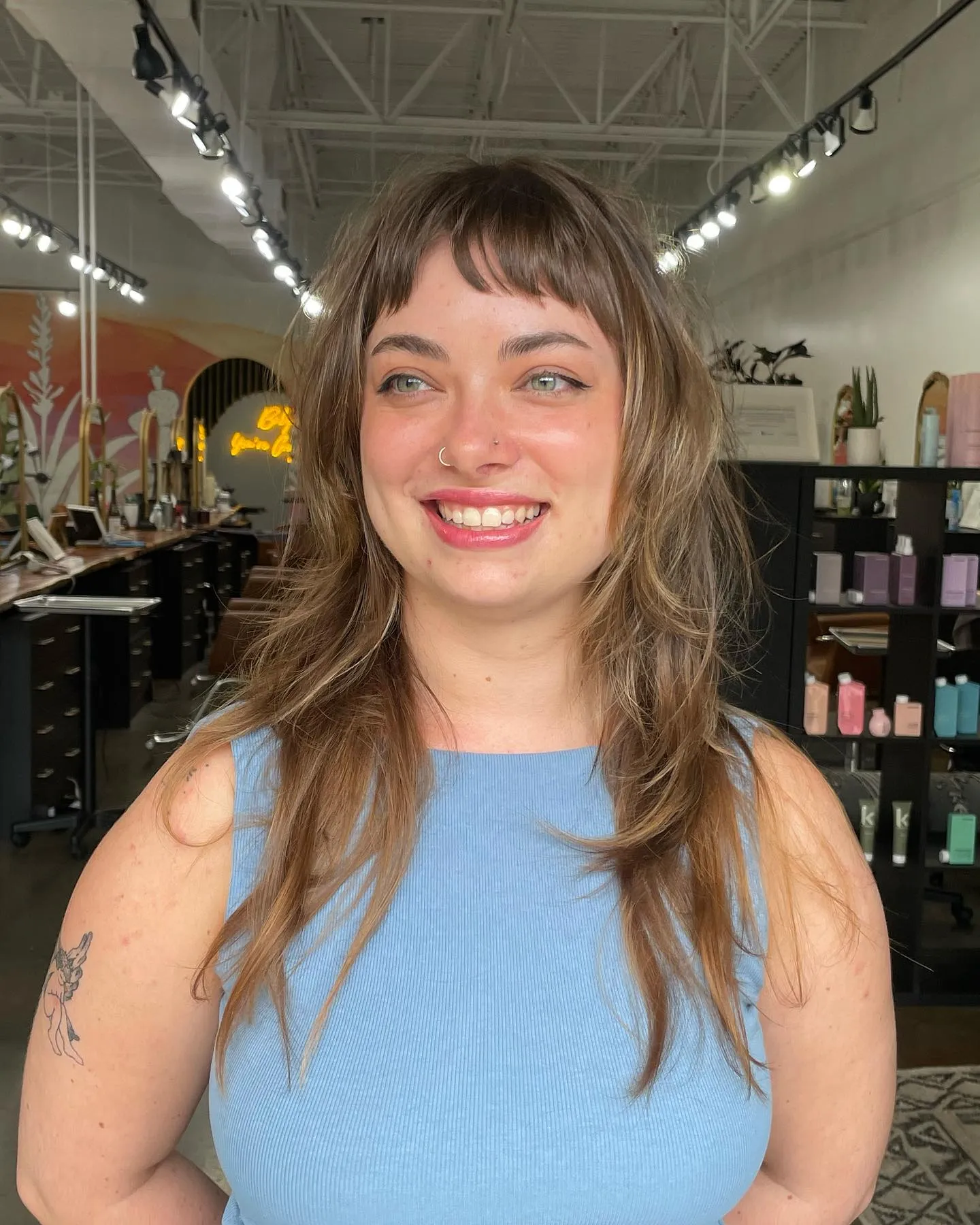 Long layered waves with soft baby bangs
