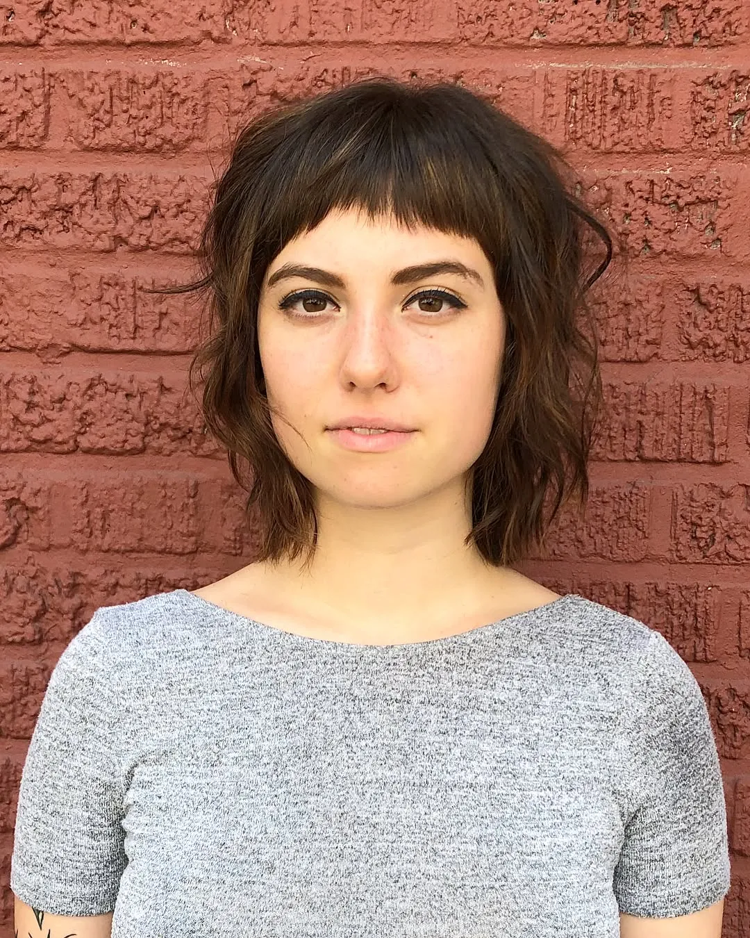 Shaggy bob with blunt baby bangs