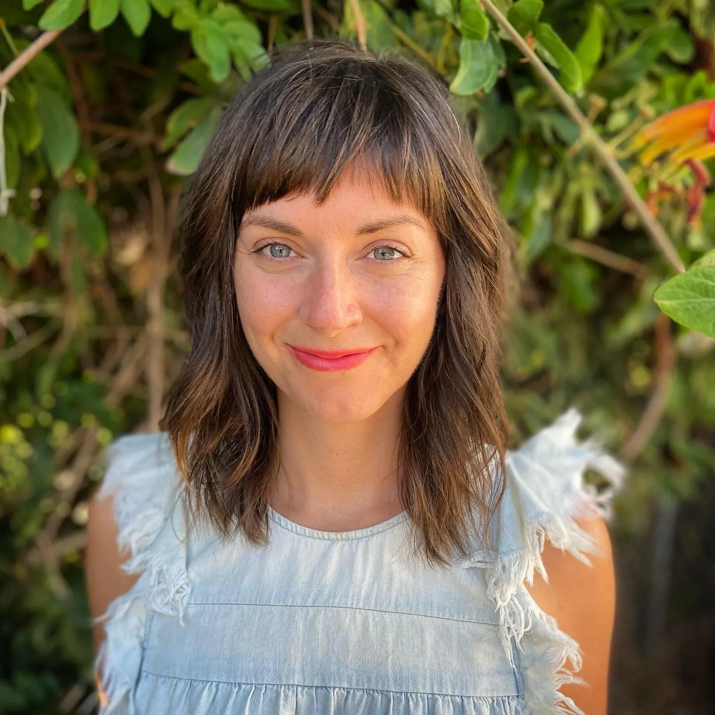 Long shag haircut with wispy baby bangs