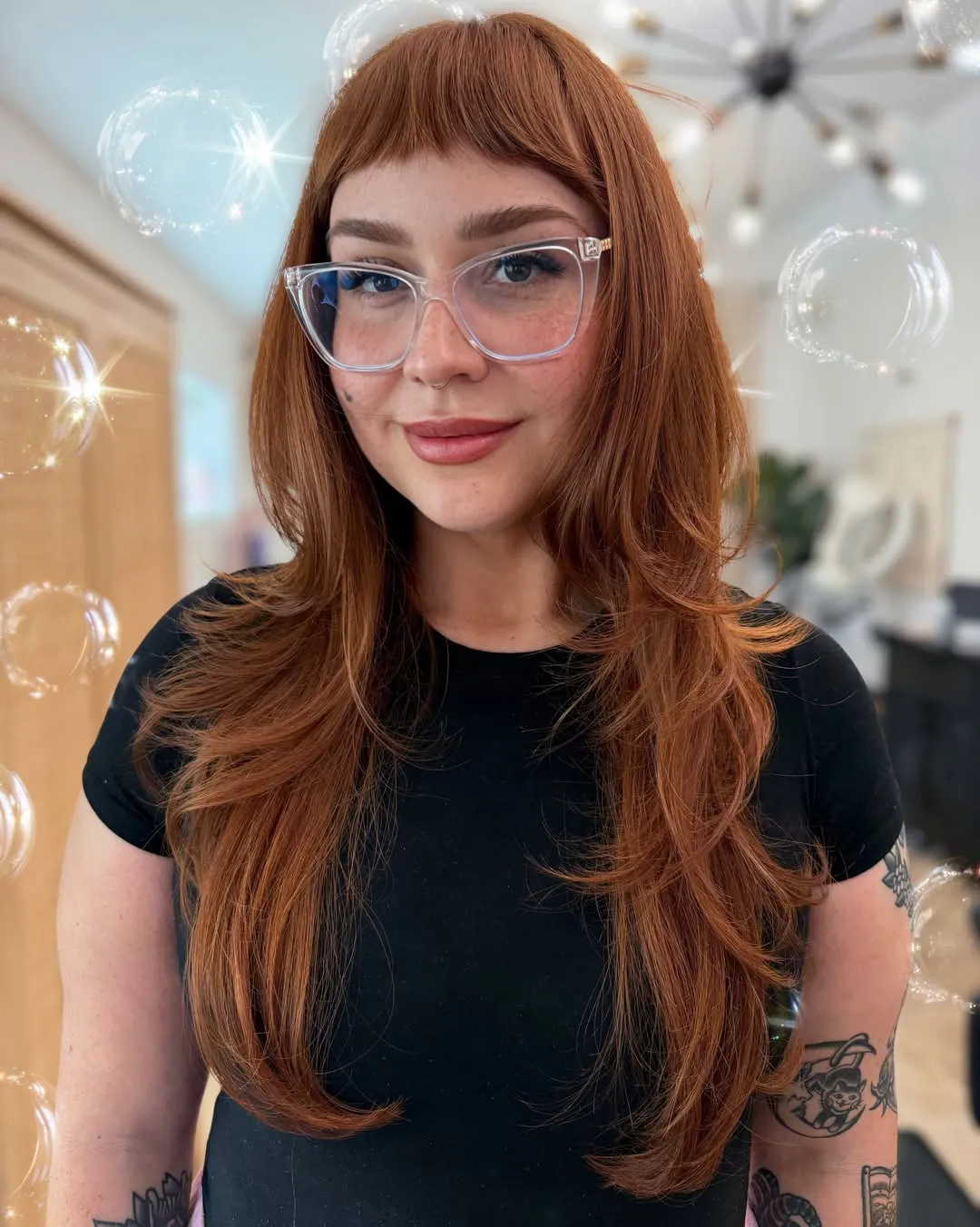 Long straight hair with blunt baby bangs