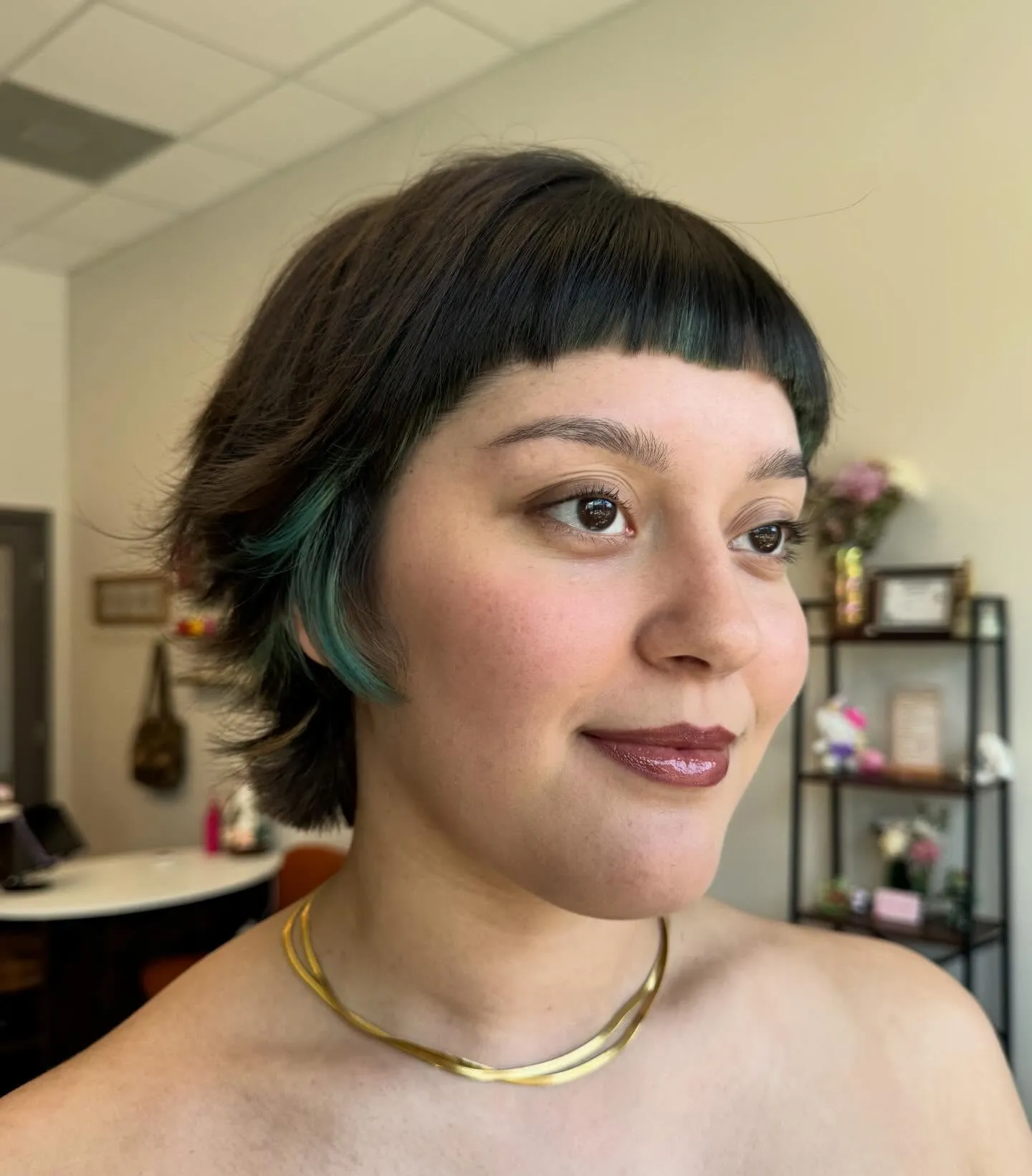 Short layered bob with rounded baby bangs
