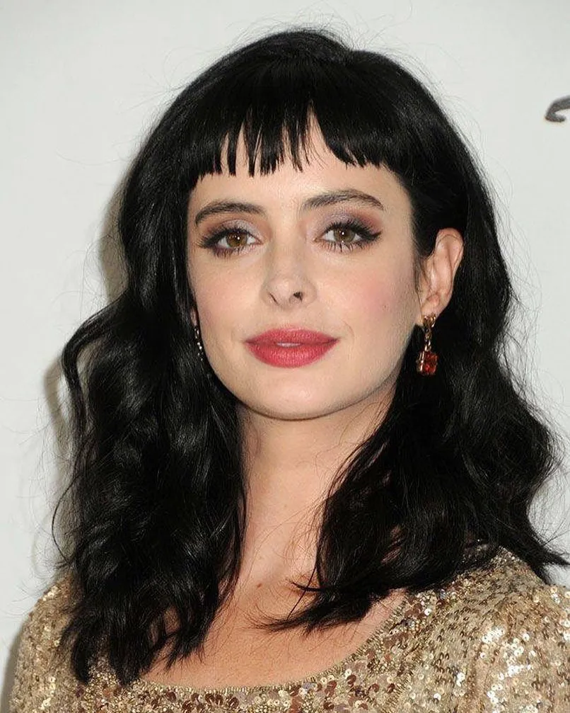Long wavy hair with choppy baby bangs