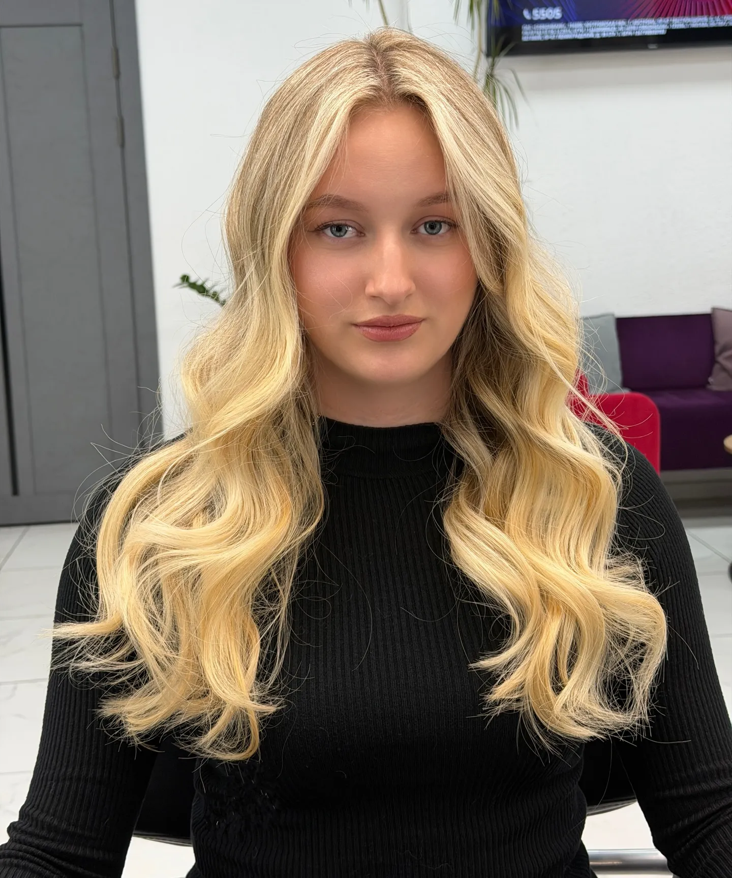Long baby blonde hair with full waves