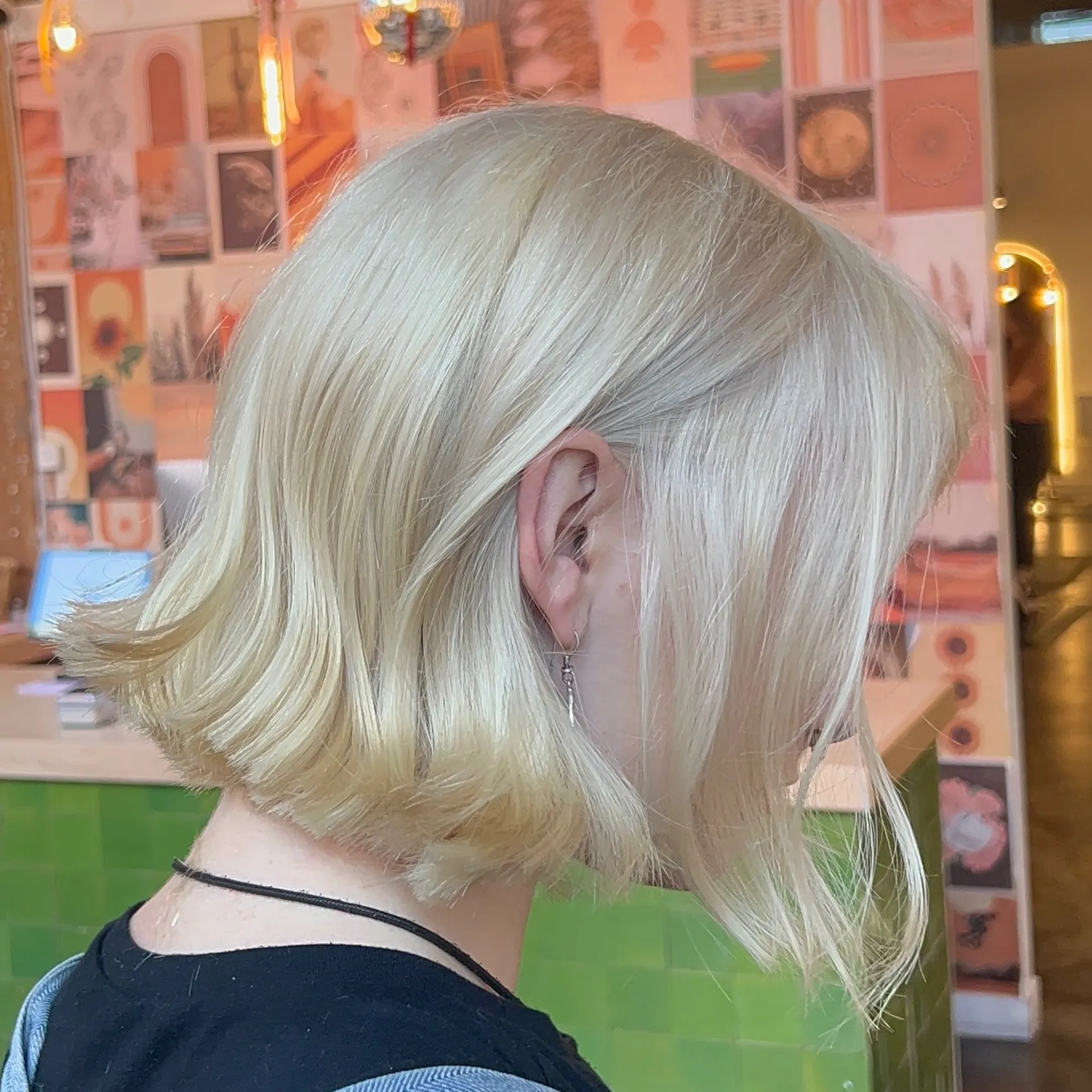 Flipped baby blonde bob with side fringe