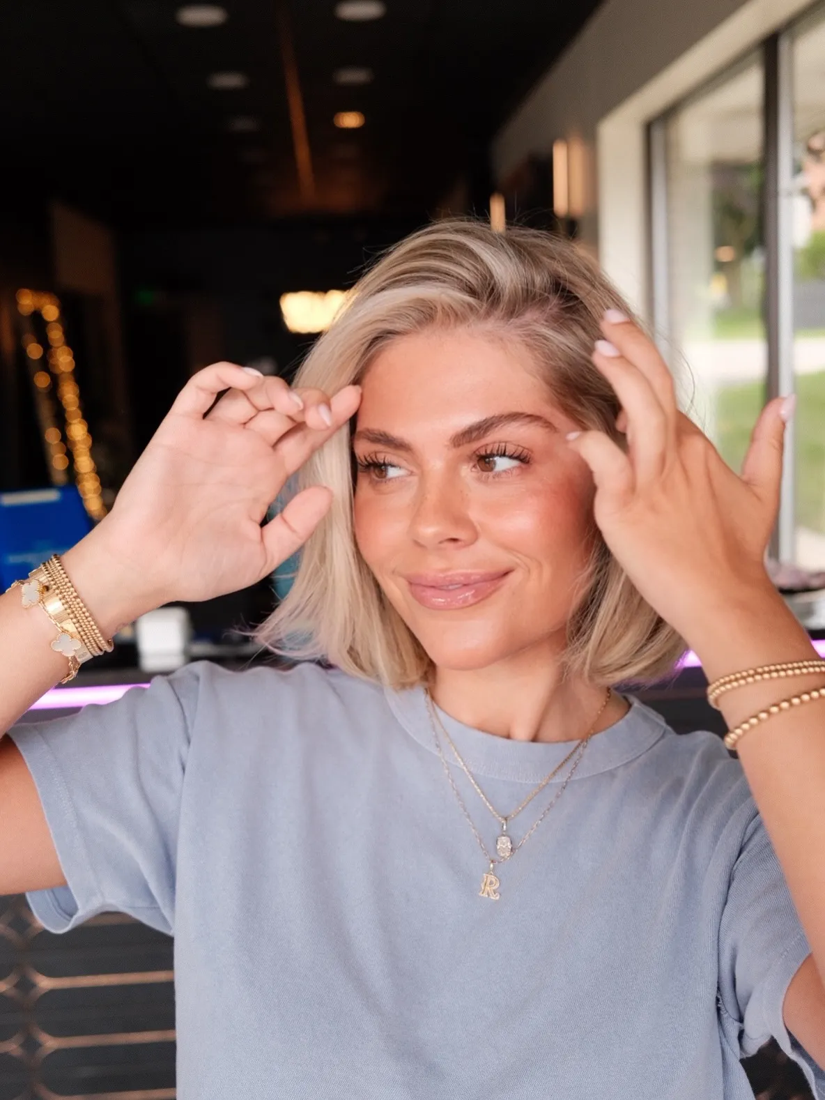 Short baby blonde bob with tucked side