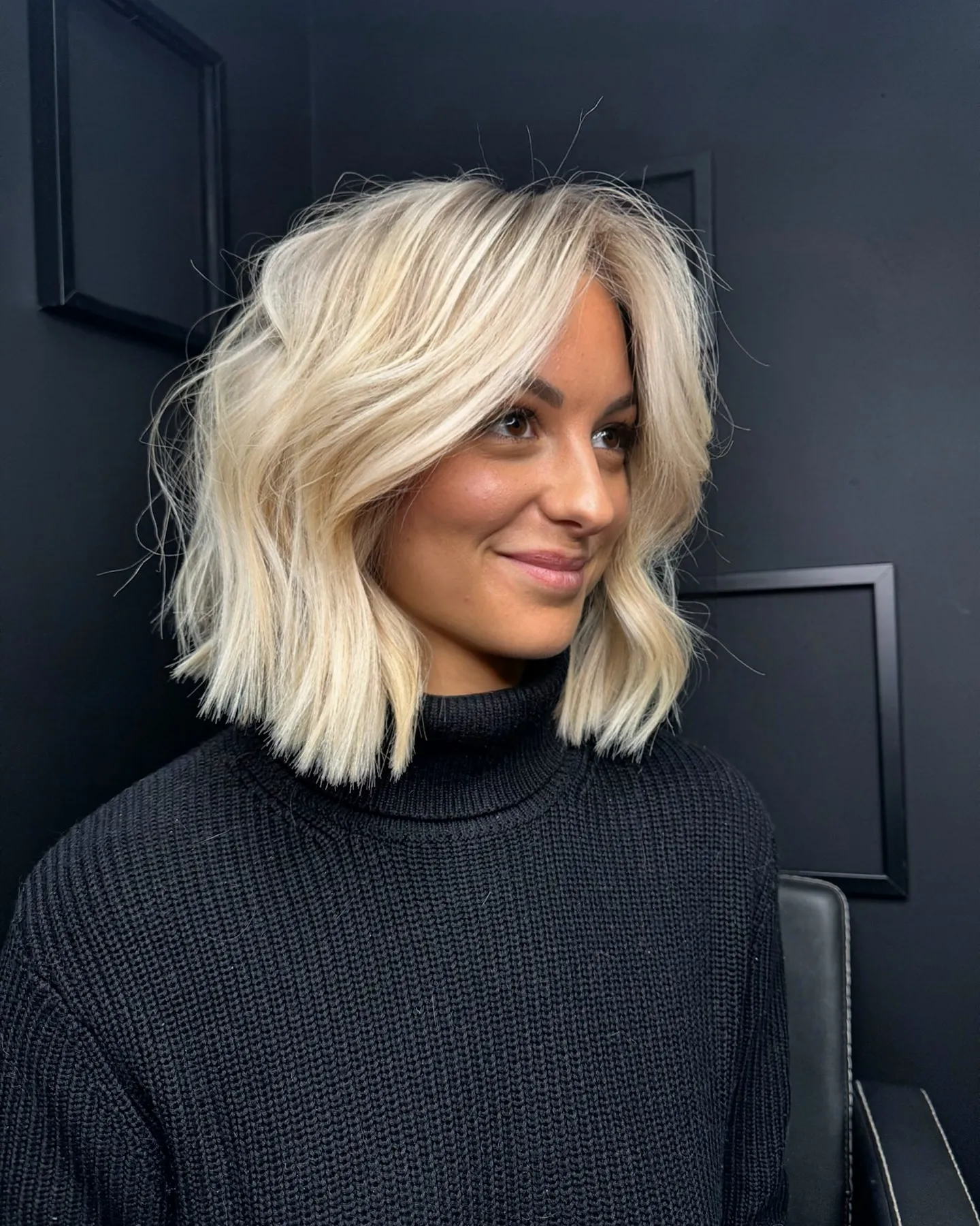 Wavy baby blonde bob with side sweep
