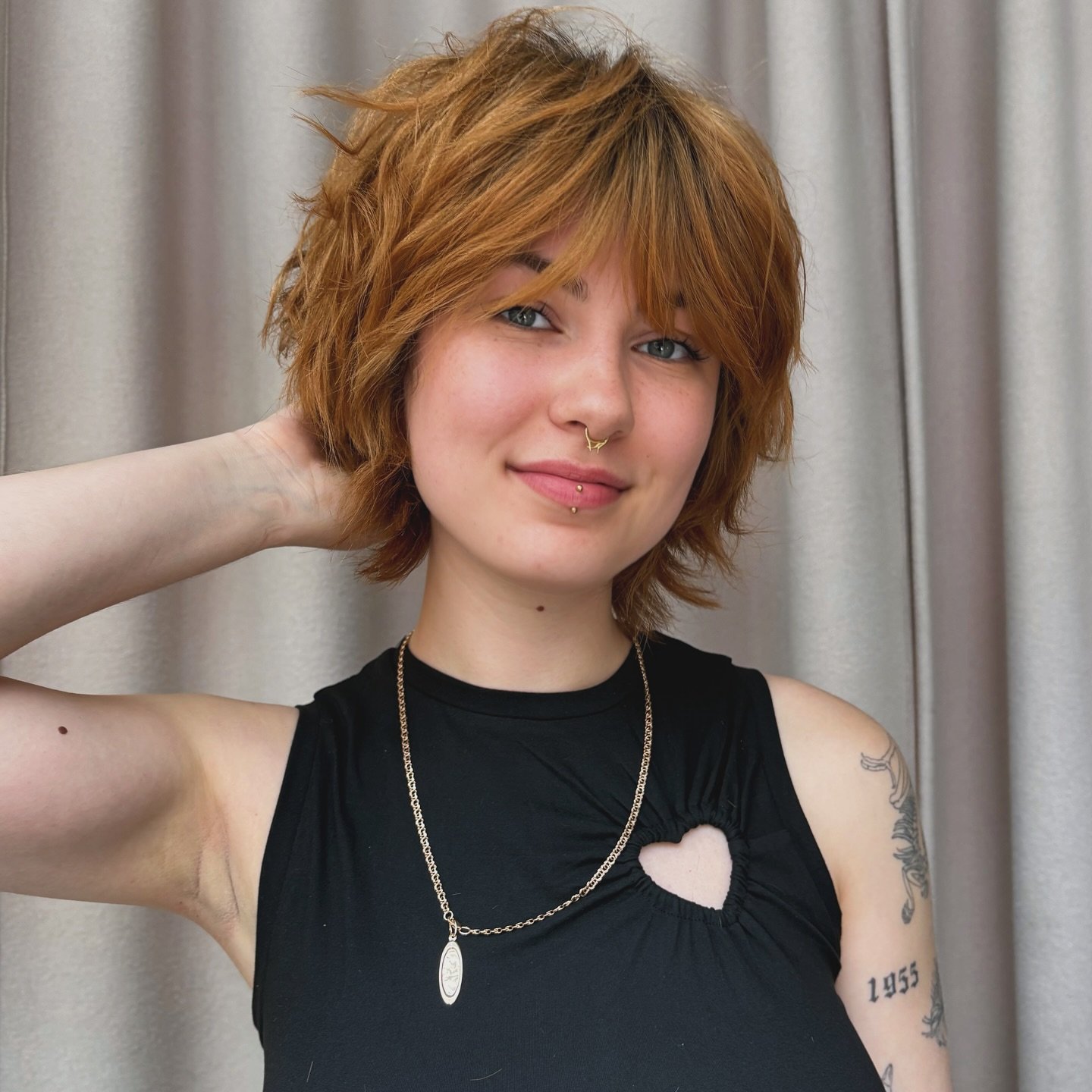Shaggy layered bixie with wispy fringe and flicked ends