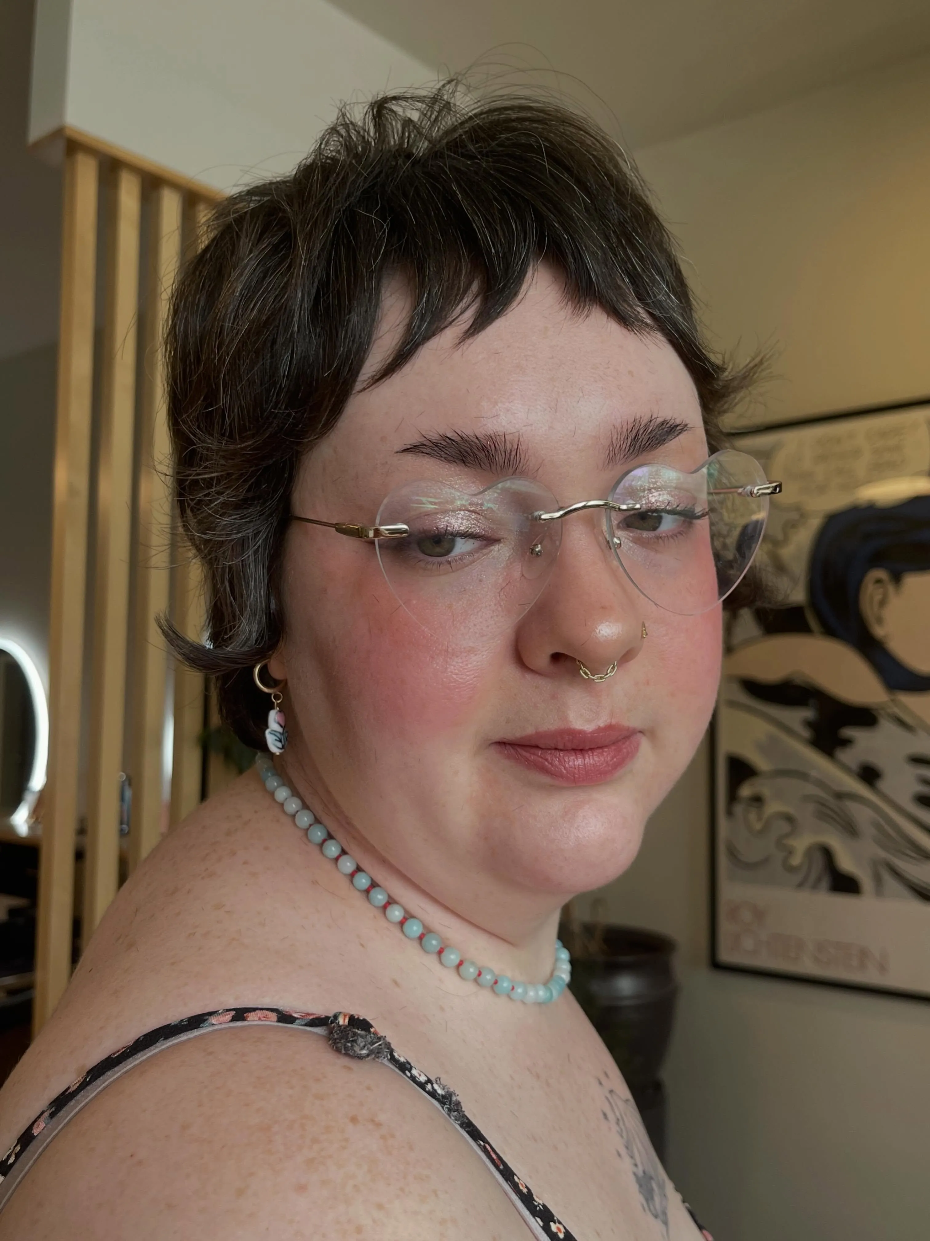 Piecey dark bixie with broken short fringe and lifted crown