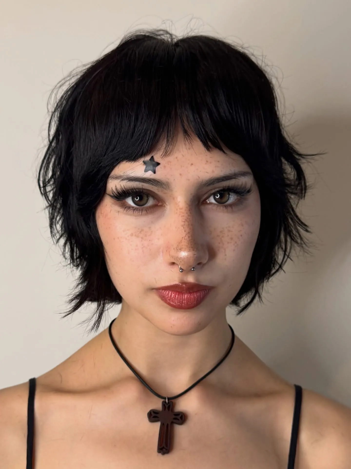 Choppy black bixie with short bangs and separated ends