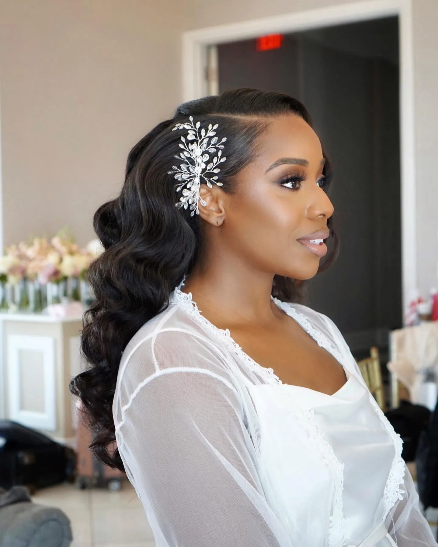 Side-swept bridal waves with a crystal hair comb