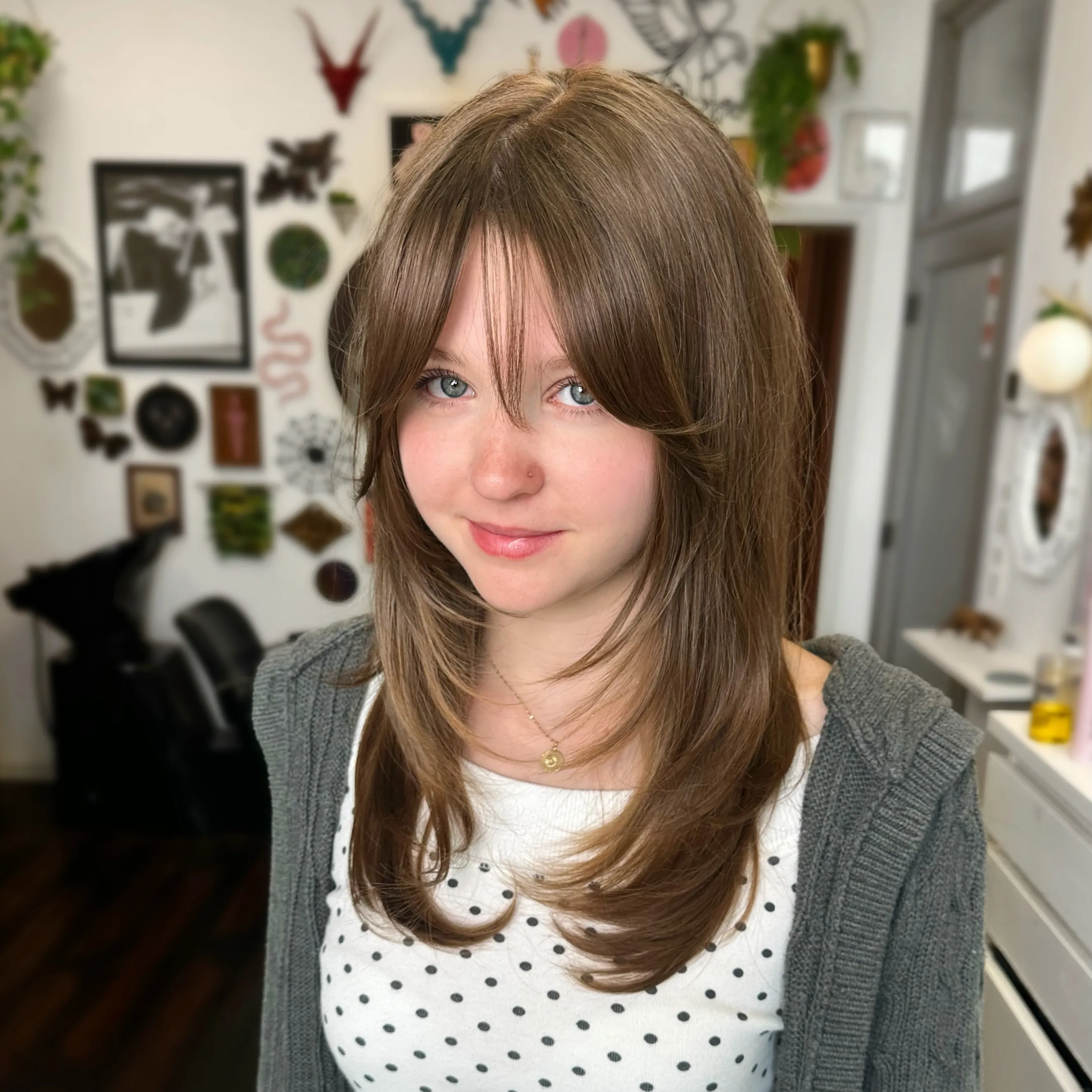 Medium brown butterfly shag with wispy bangs and layered ends