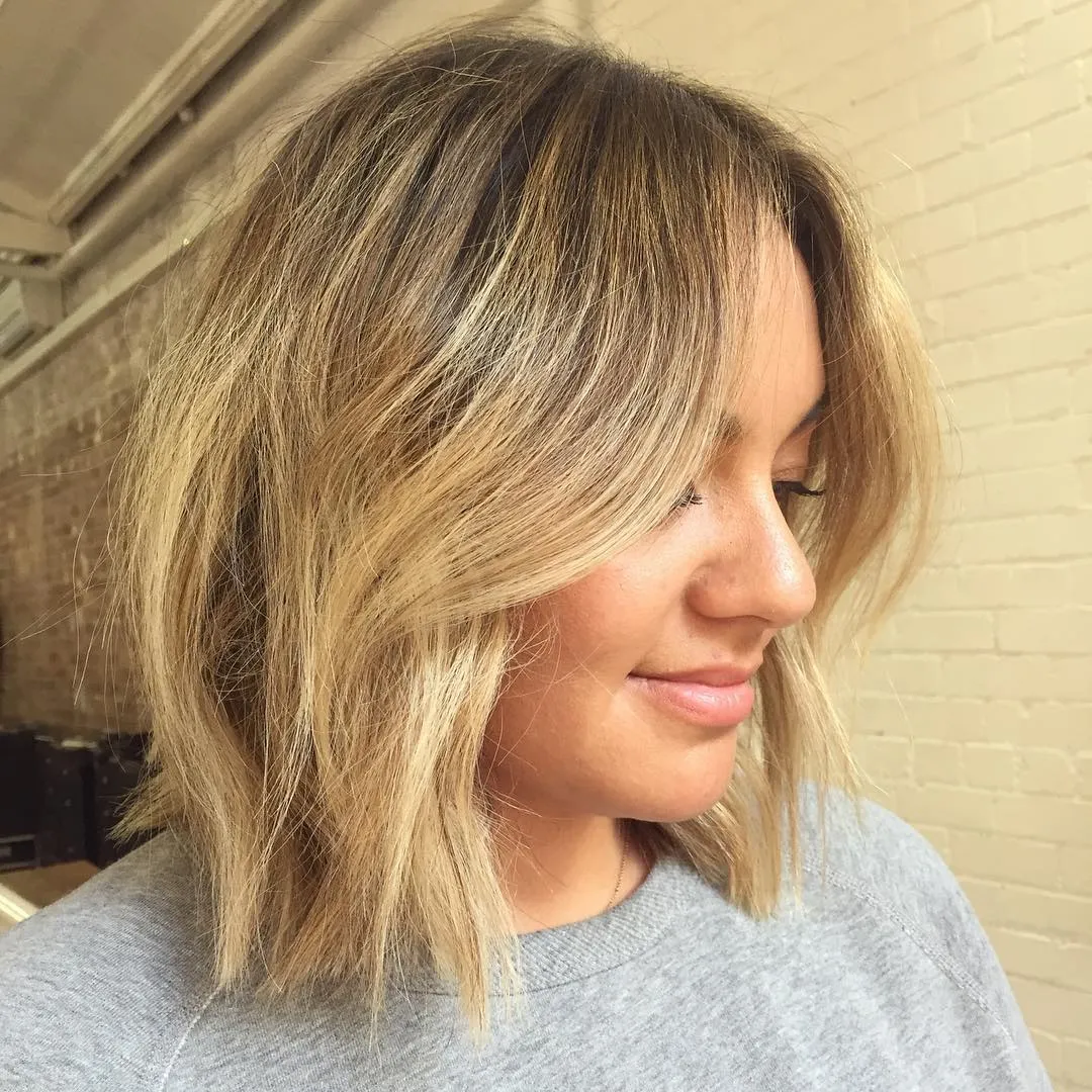 Wavy choppy lob with face-framing pieces