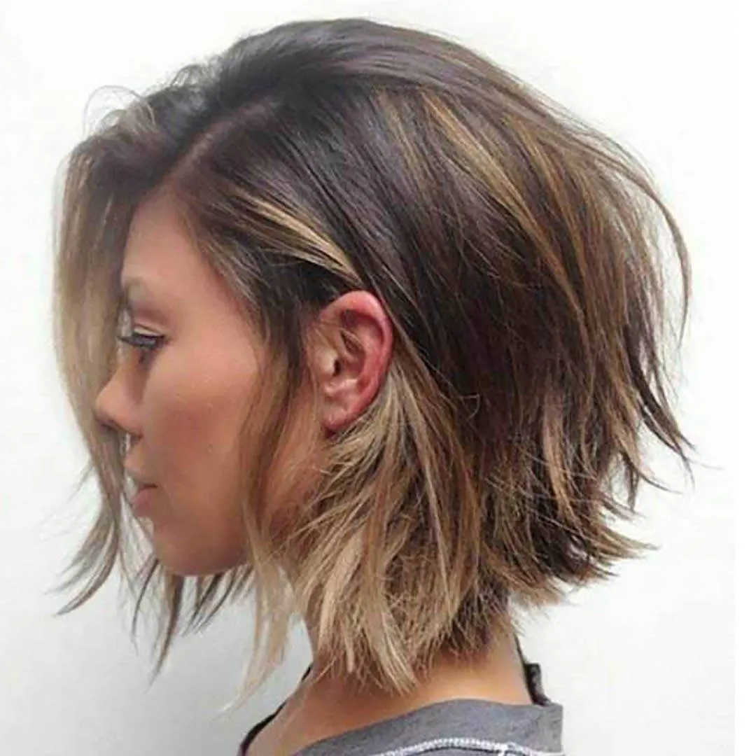 Razor-cut choppy bob with swept-back layers