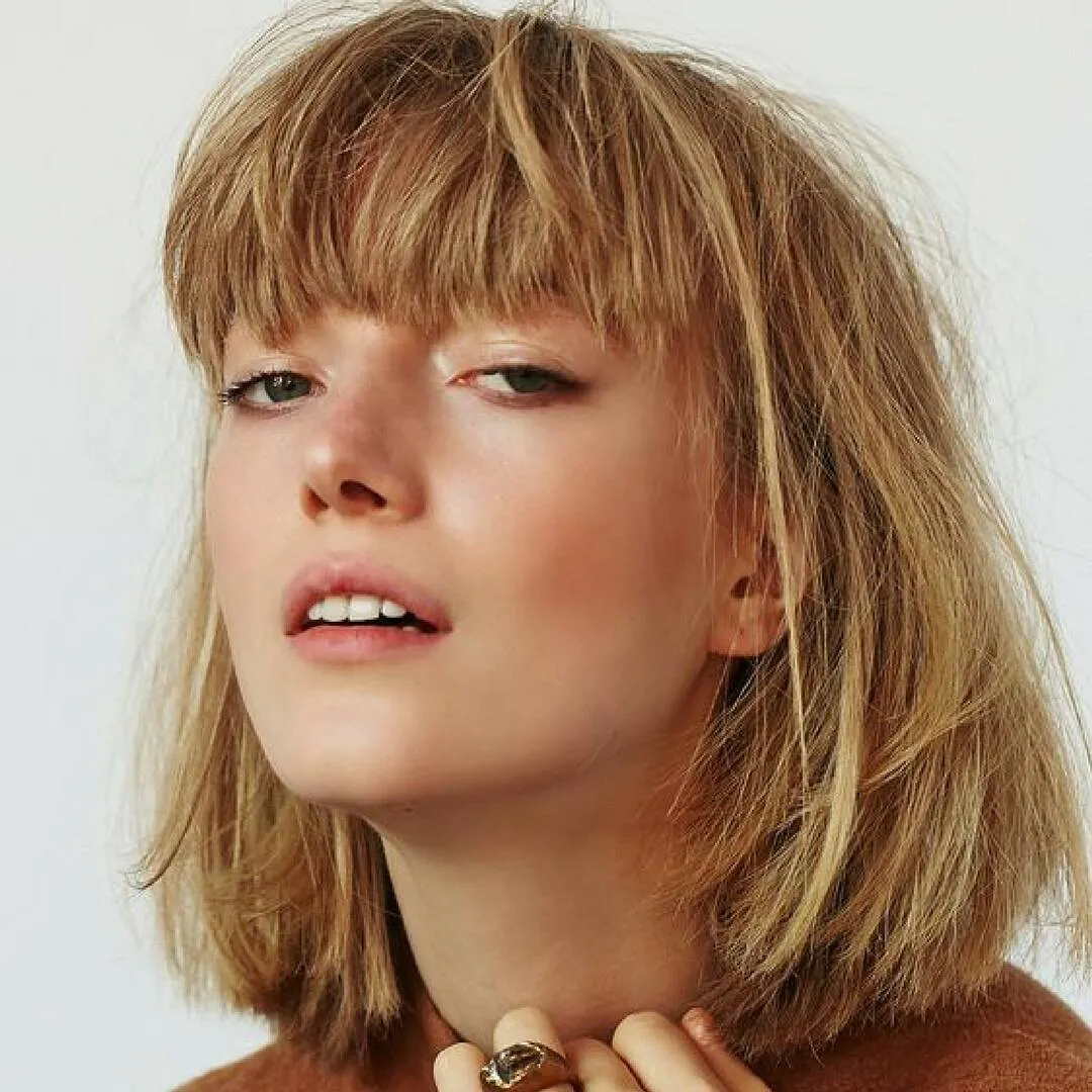 Shaggy choppy bob with full textured fringe