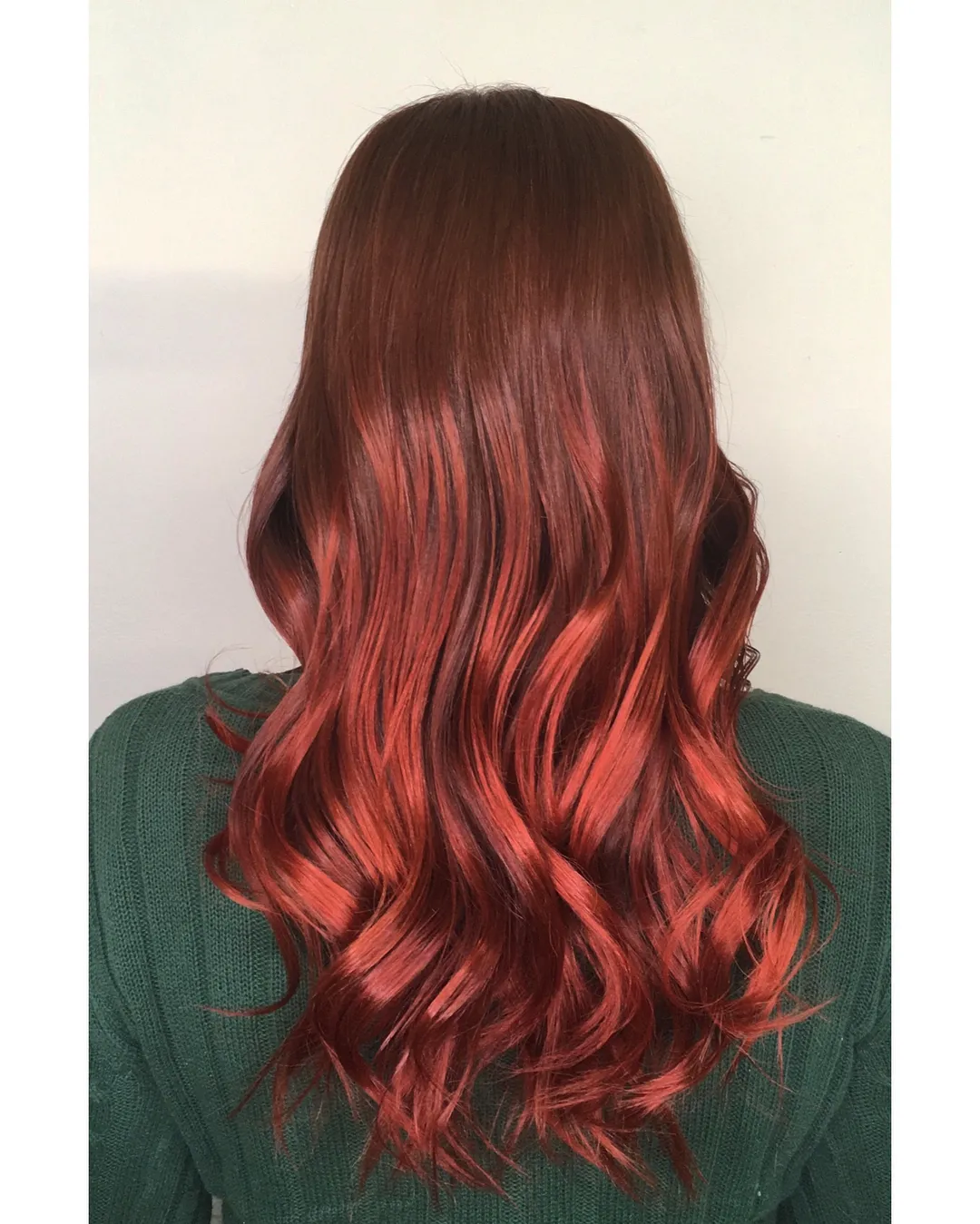 Long deep copper-red hair with soft flowing waves