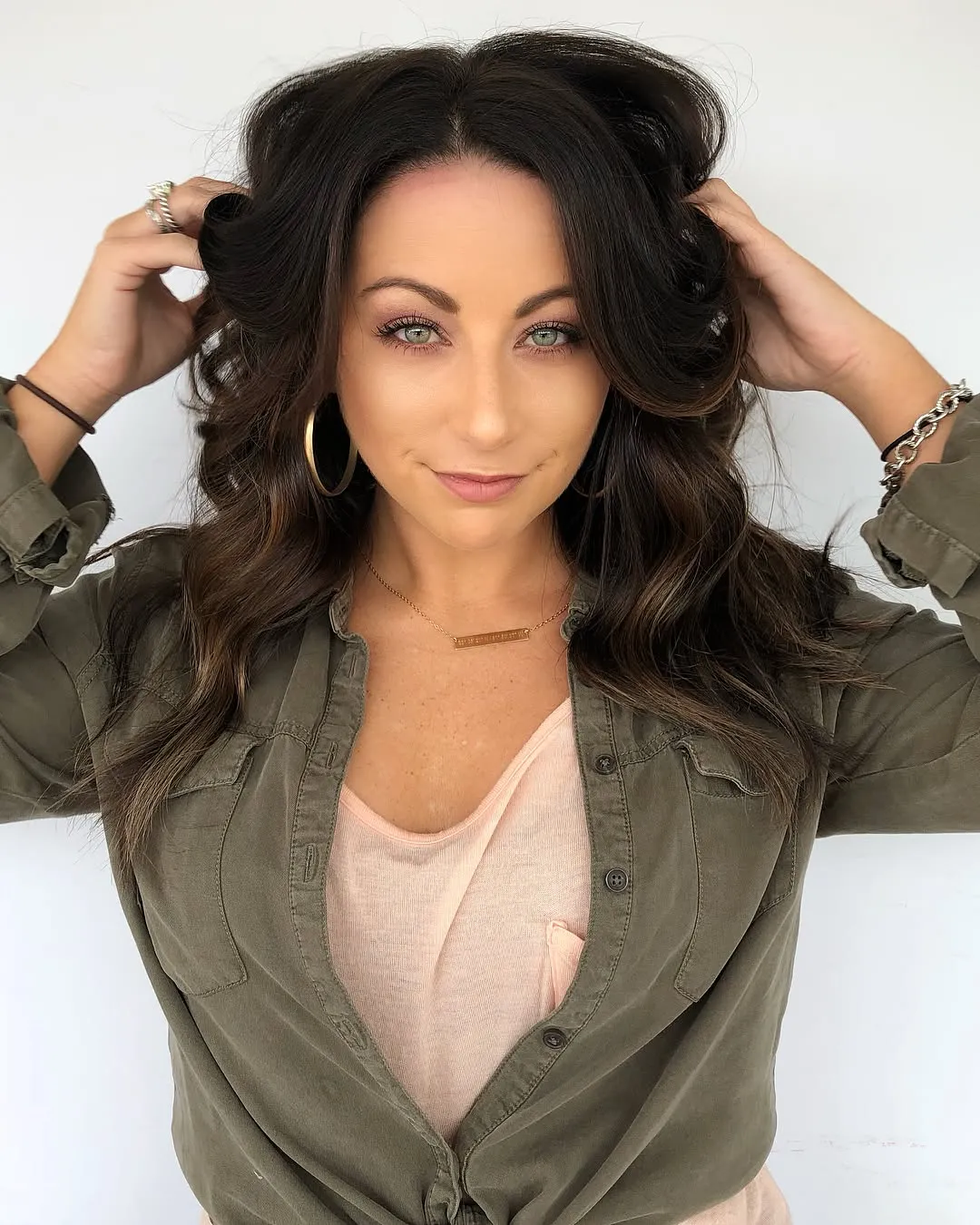 Long dark brown waves with lighter ends and soft volume