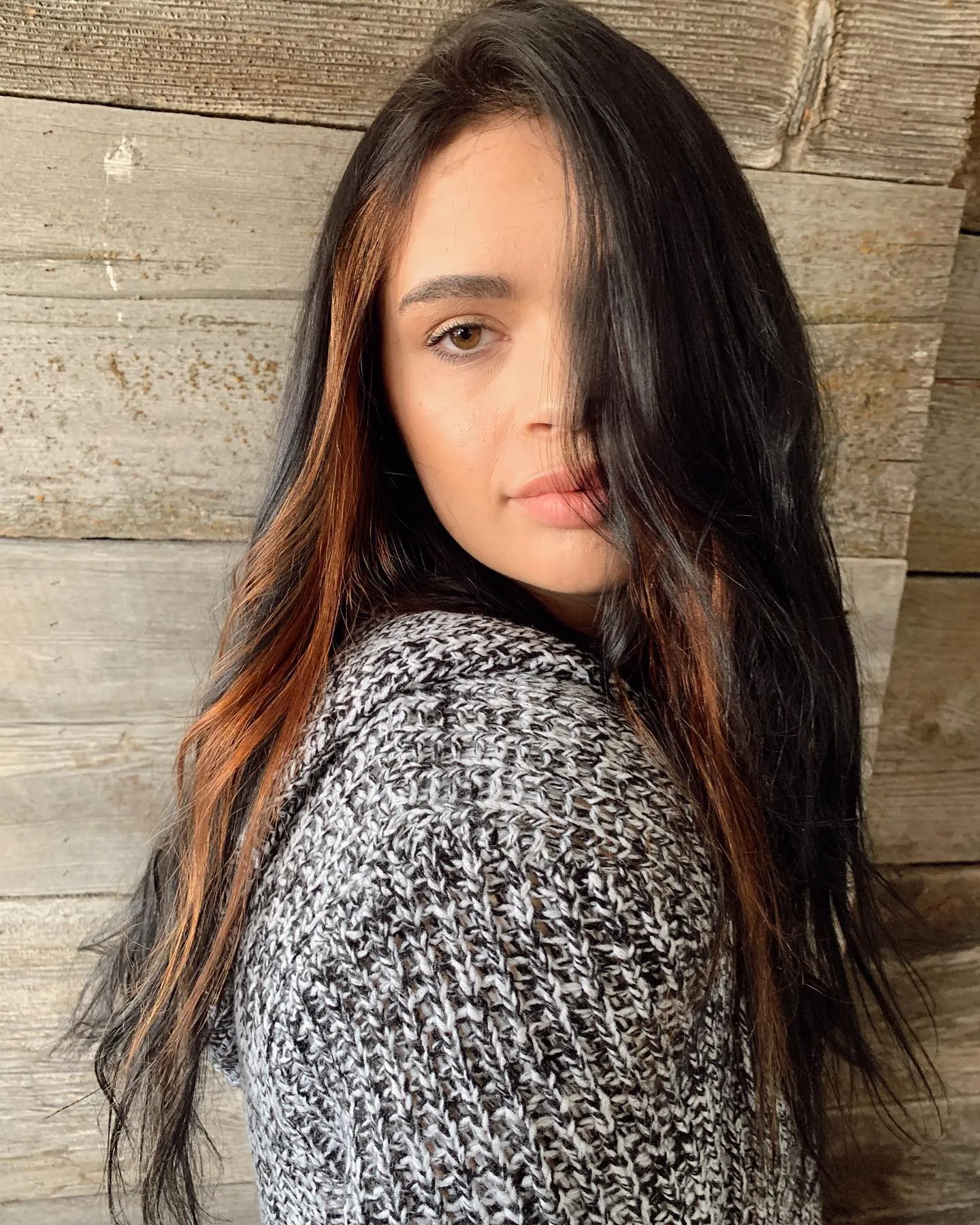 Long dark hair with copper balayage ends