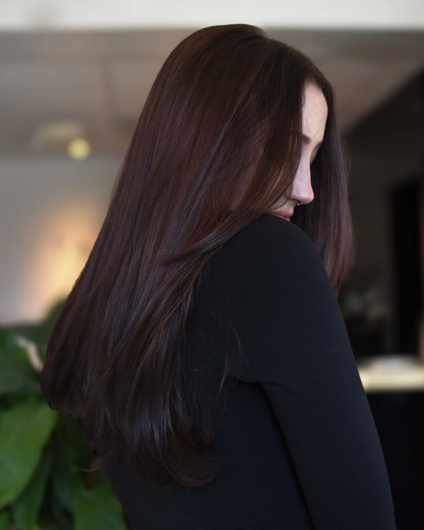 Long straight dark auburn hair with soft shine