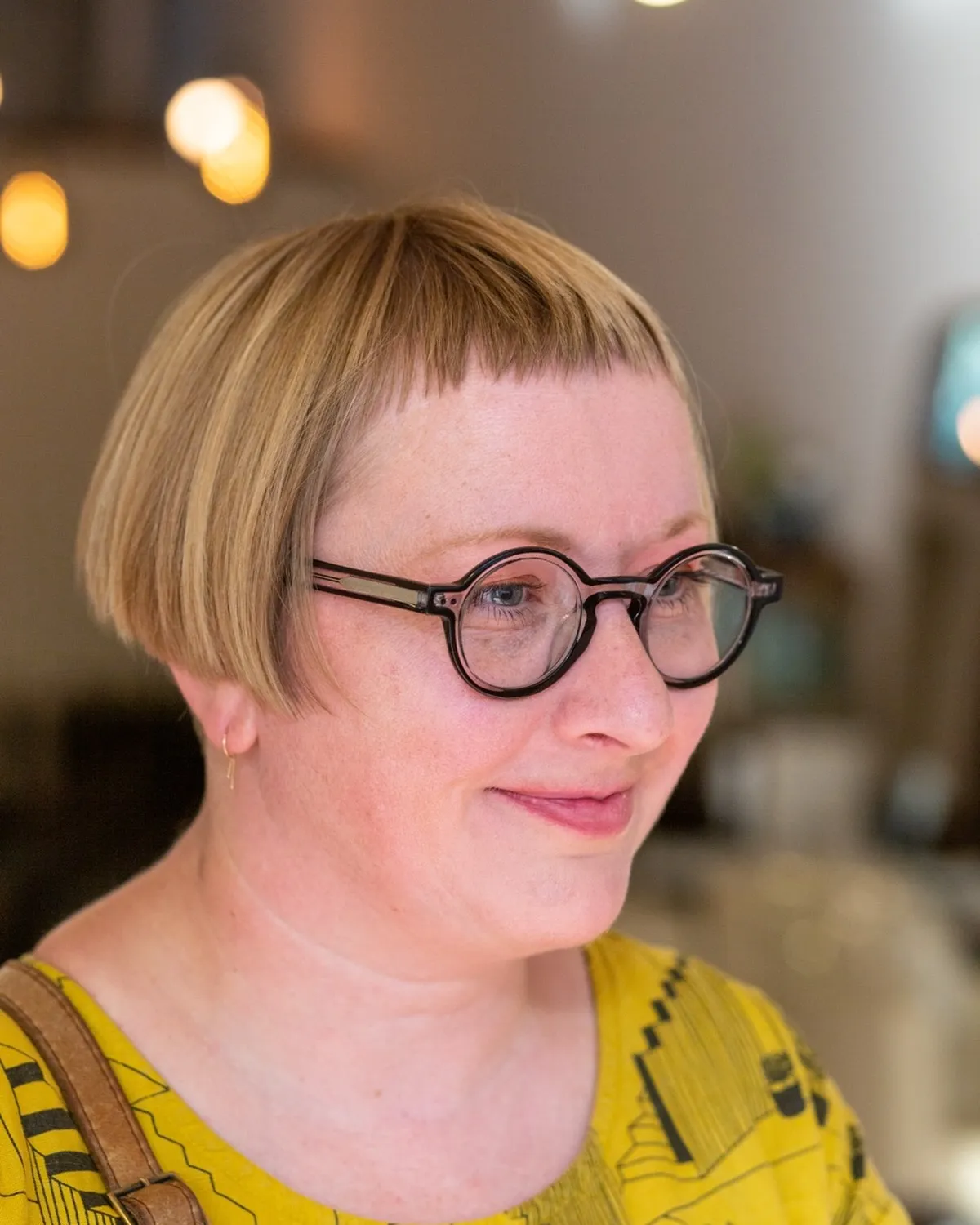 Rounded ear-length bob with very short baby fringe