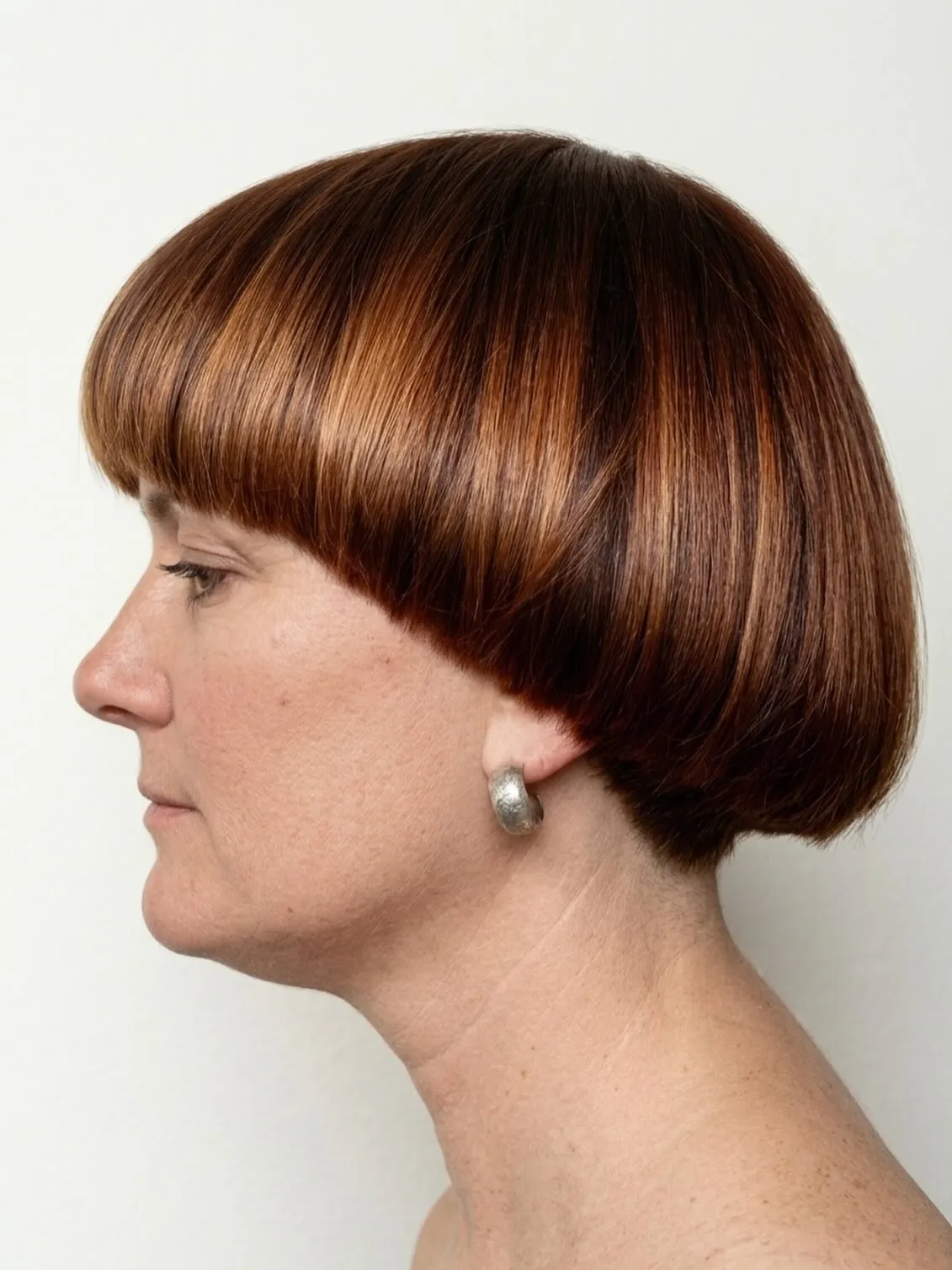Sculpted rounded ear-length bob with curved fringe